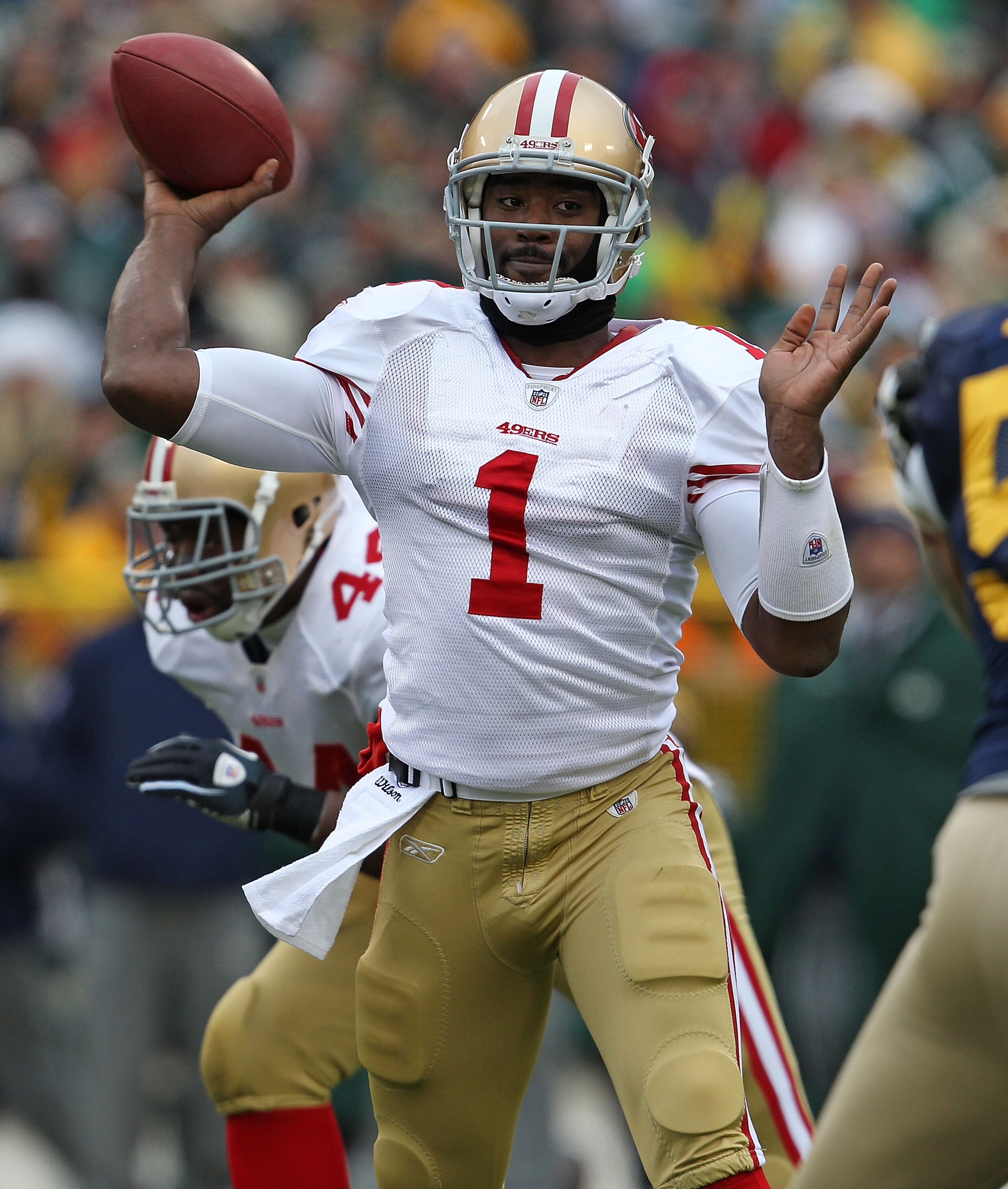 GREEN BAY, WI - DECEMBER 05: Troy Smith #1 of the San Francisco 49ers throws a pass against the Green Bay Packers at Lambeau Field on December 5, 2010 in Green Bay, Wisconsin. (Photo by Jonathan Daniel/Getty Images)