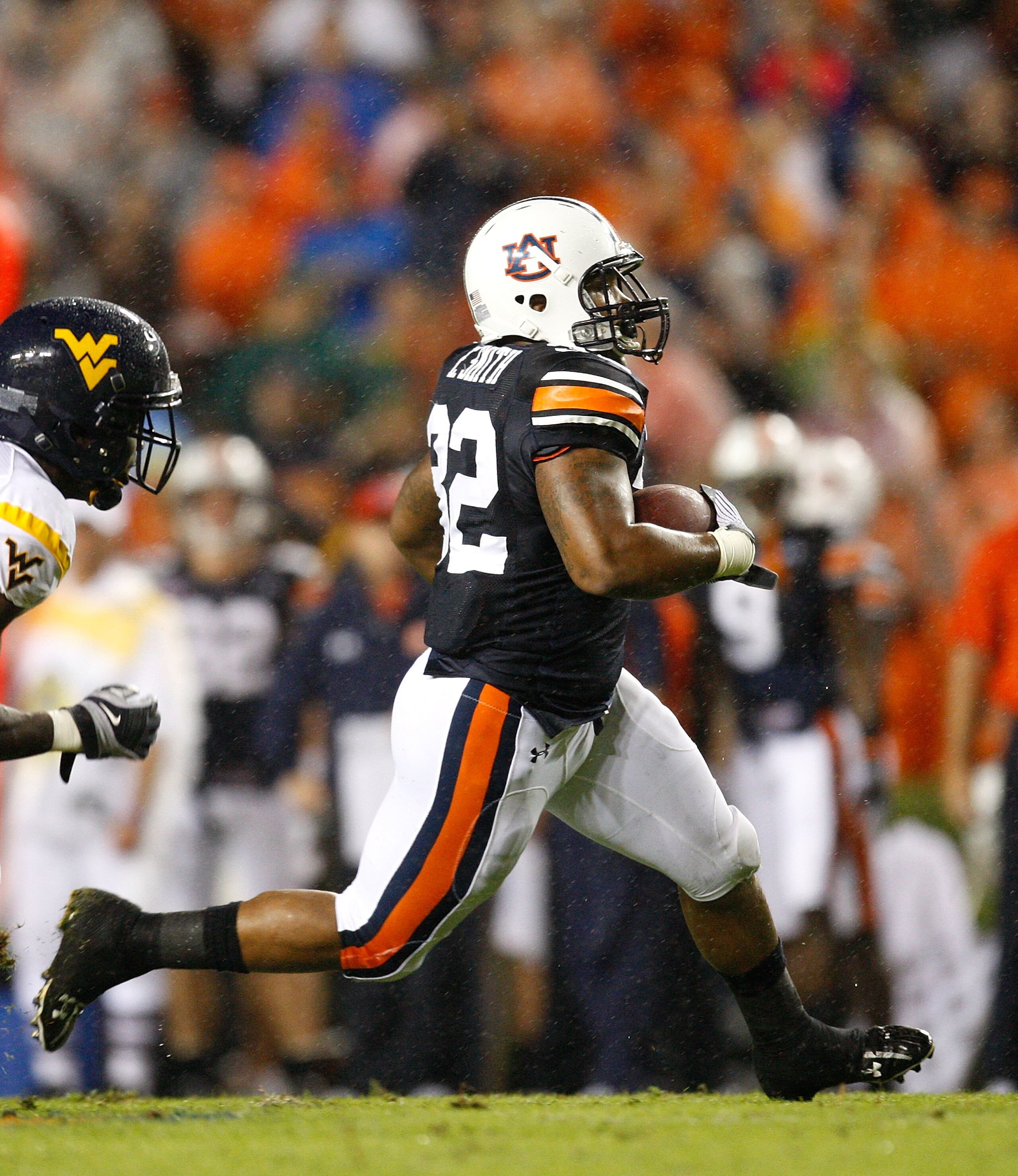 AUBURN, AL - SEPTEMBER 19: Eric Smith #32 of the Auburn Tigers against the West Virginia Mountaineers at Jordan-Hare Stadium on September 19, 2009 in Auburn, Alabama. (Photo by Kevin C. Cox/Getty Images) AUBURN, AL - SEPTEMBER 19: Eric Smith #32 of the Auburn Tigers against the West Virginia Mountaineers at Jordan-Hare Stadium on September 19, 2009 in Auburn, Alabama. (Photo by Kevin C. Cox/Getty Images)