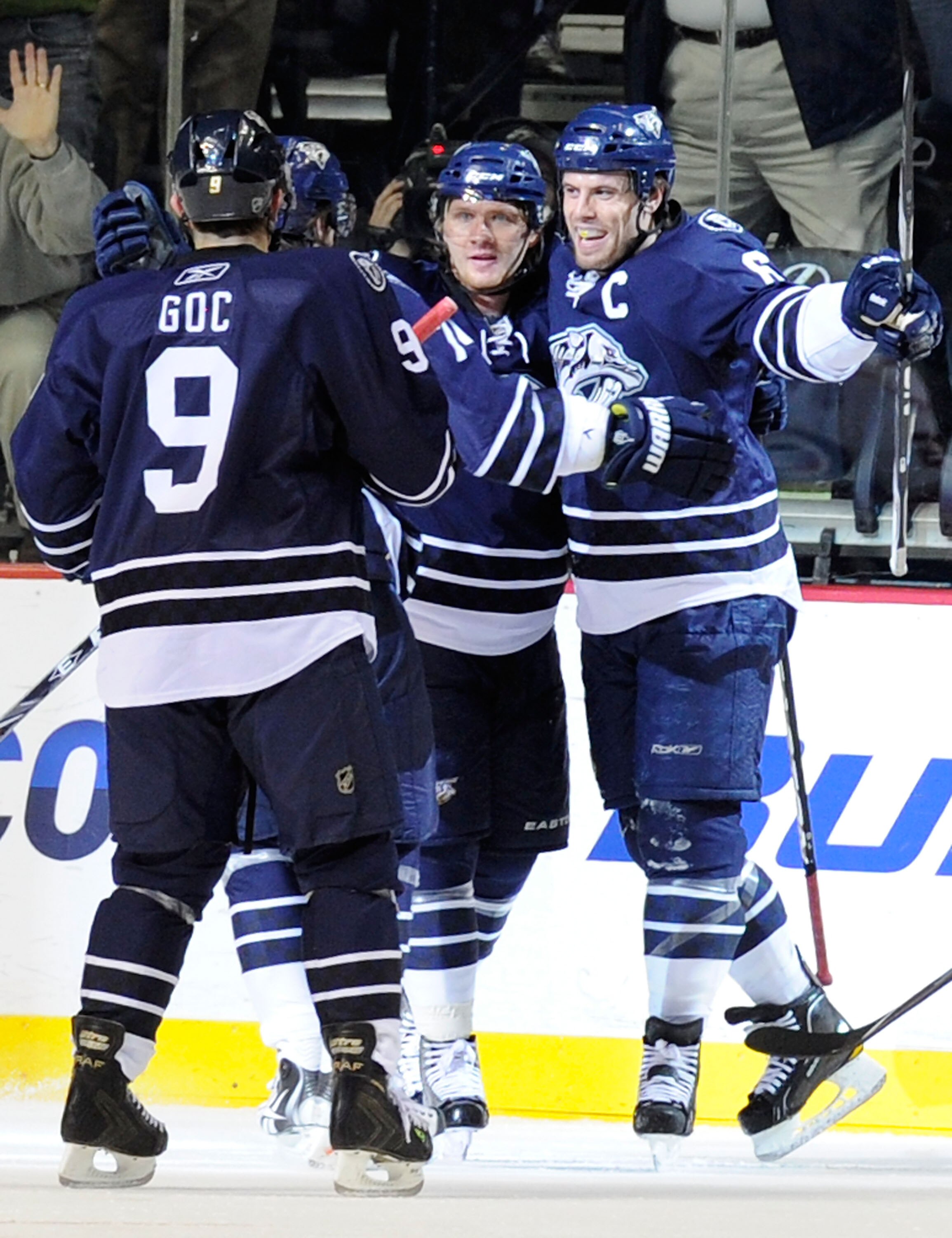 NASHVILLE, TN - DECEMBER 04:  Marcel Goc #9, Martin Erat #10, and Shea Weber #6 of the Nashville Predators celebrate a goal against the Carolina Hurricanes on December 4, 2010 at the Bridgestone Arena in Nashville, Tennessee.  (Photo by Frederick Breedon/