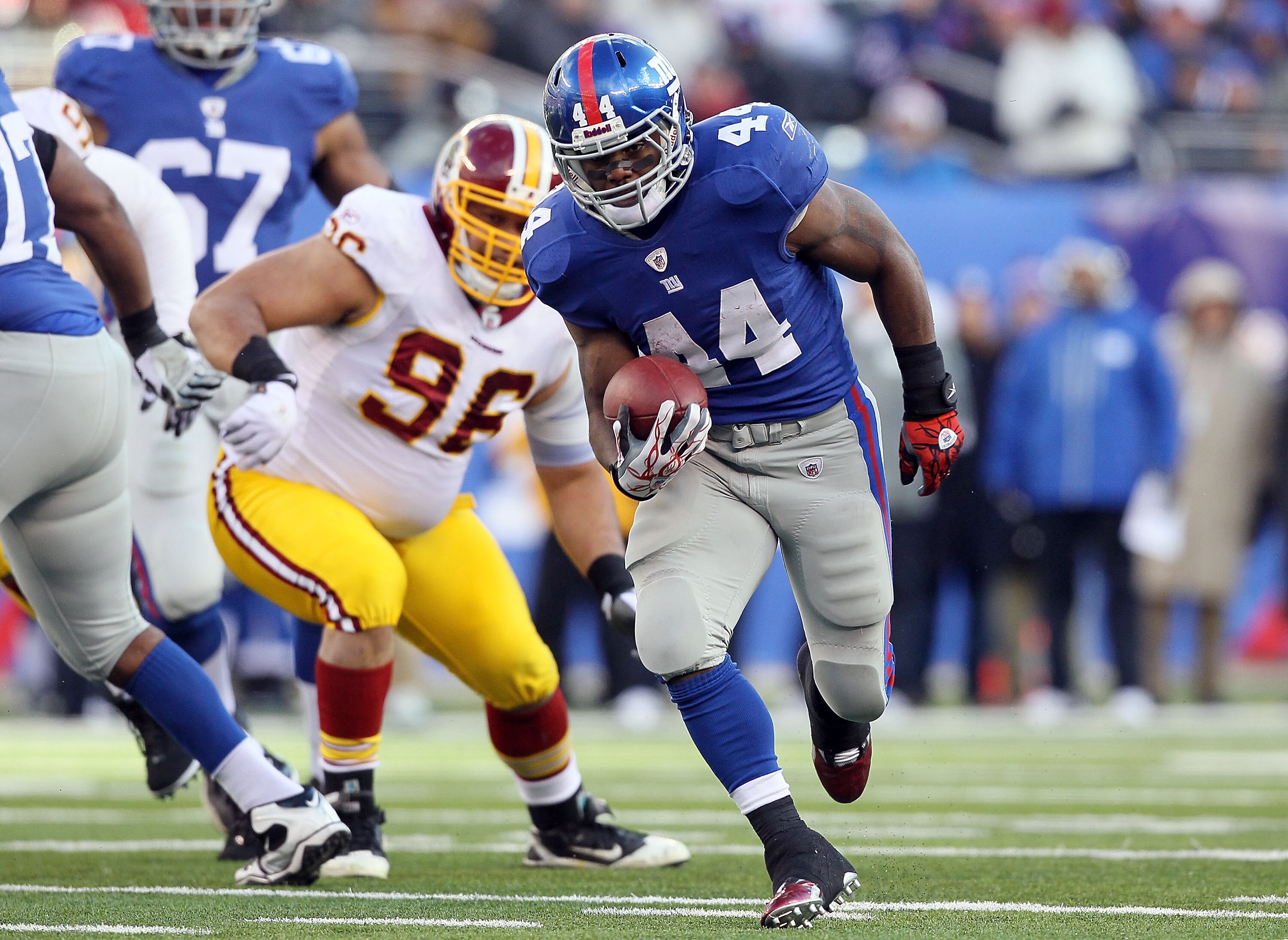 EAST RUTHERFORD, NJ - DECEMBER 05:  Ahmad Bradshaw #44 of the New York Giants runs the ball against the Washington Redskins on December 5, 2010 at the New Meadowlands Stadium in East Rutherford, New Jersey.  (Photo by Jim McIsaac/Getty Images)