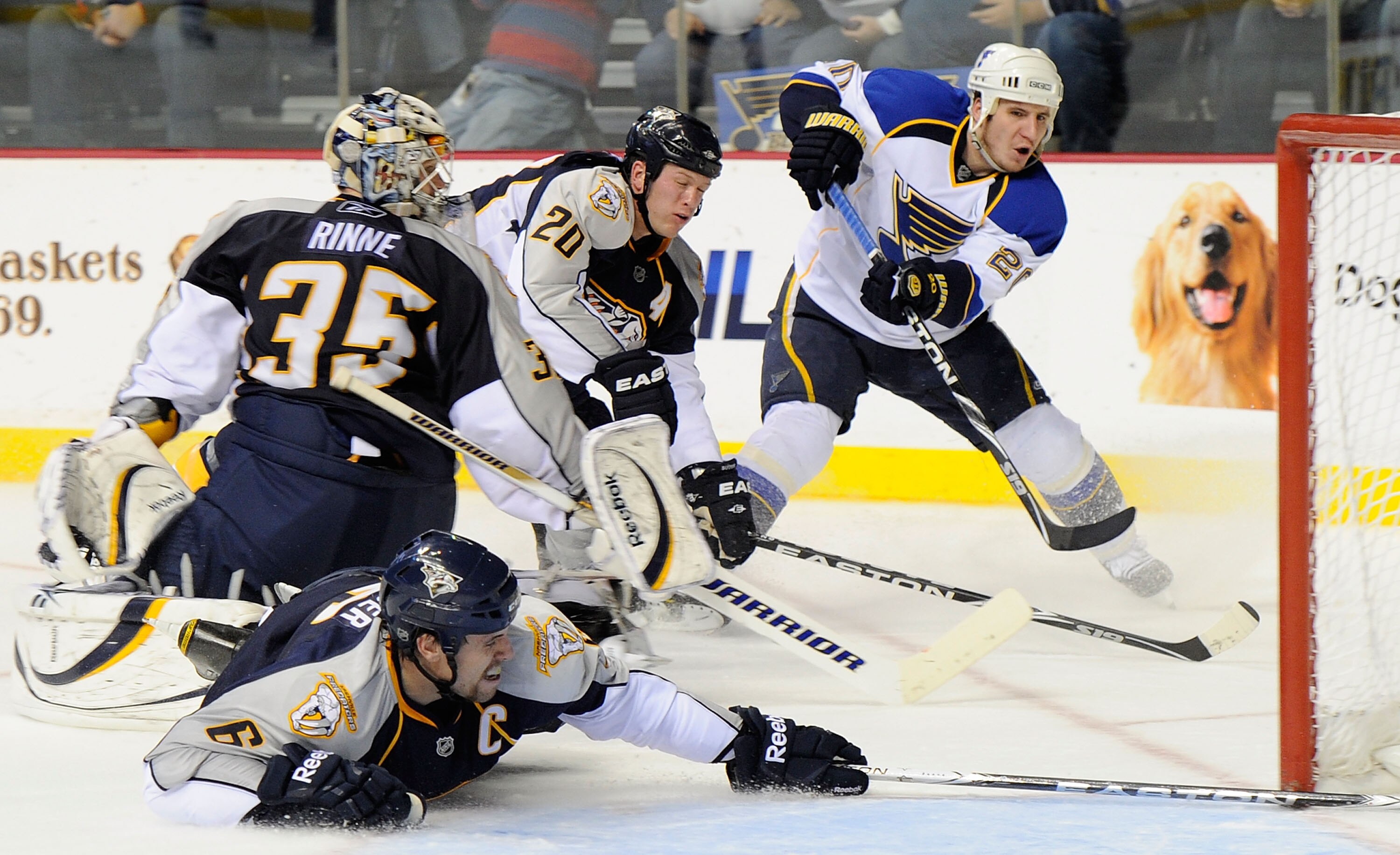 NASHVILLE, TN - NOVEMBER 24:  Alexander Steen #20 of the St. Louis Blues takes a shot wide of the net past Shea Weber #6, Pekka Rinne #35, and Ryan Suter #20 of the Nashville Predators against  on November 24, 2010 at the Bridgestone Arena in Nashville, T