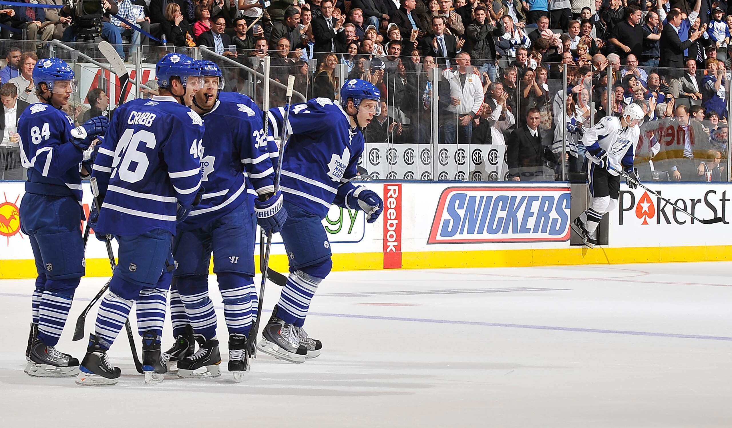 TORONTO, CANADA - NOVEMBER 30:  Victor Hedman #77 of the Tampa Bay Lightning steps out of the penalty box as Nikolai Kulemin #41 of the Toronto Maple Leafs celebrates a second period goal during game action November 30, 2010 at the Air Canada Centre in To