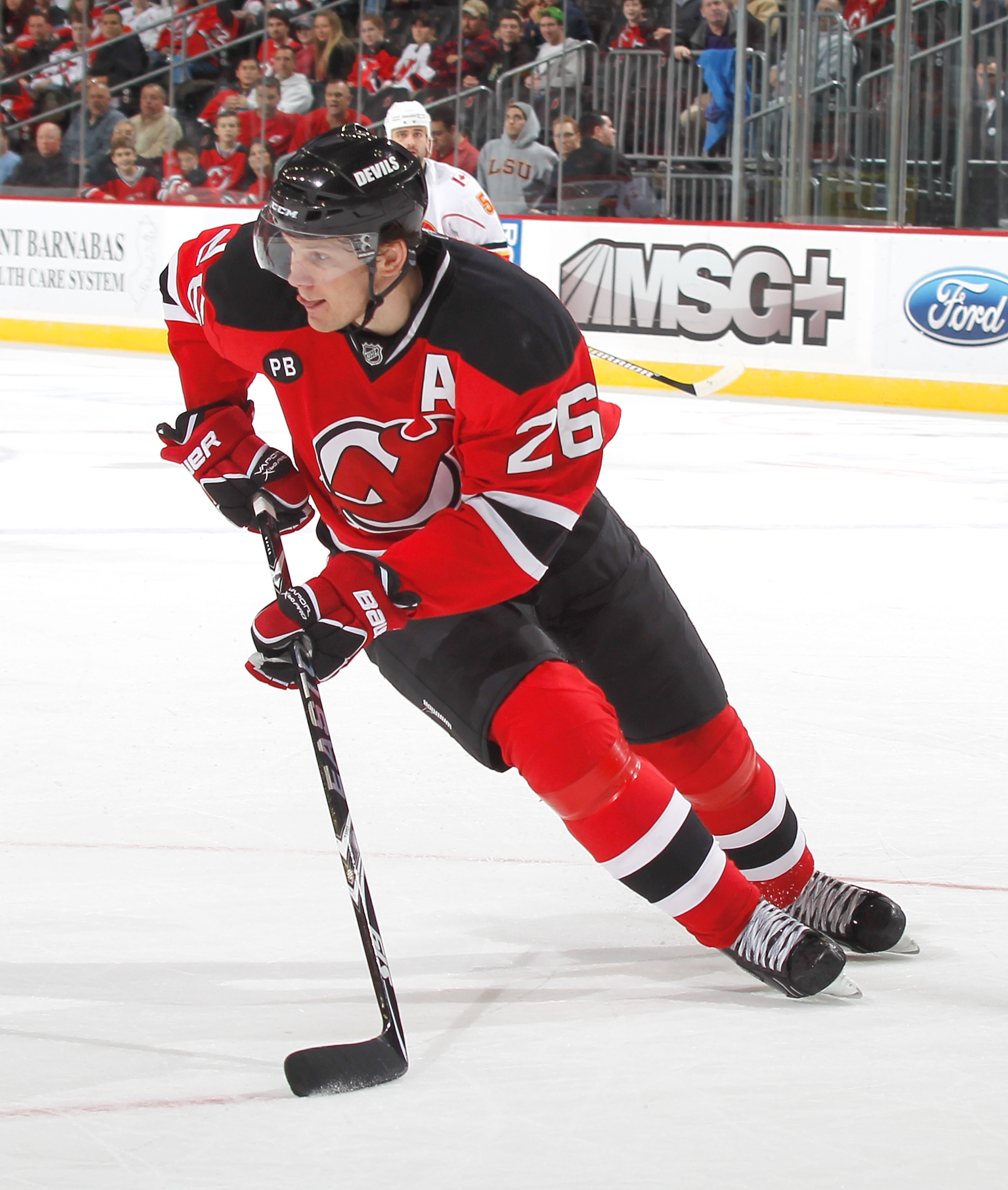 NEWARK, NJ - NOVEMBER 24:  Patrik Elias #26 of the New Jersey Devils skates during a hockey game against the Calgary Flames at the Prudential Center on November 24, 2010 in Newark, New Jersey.  (Photo by Paul Bereswill/Getty Images)
