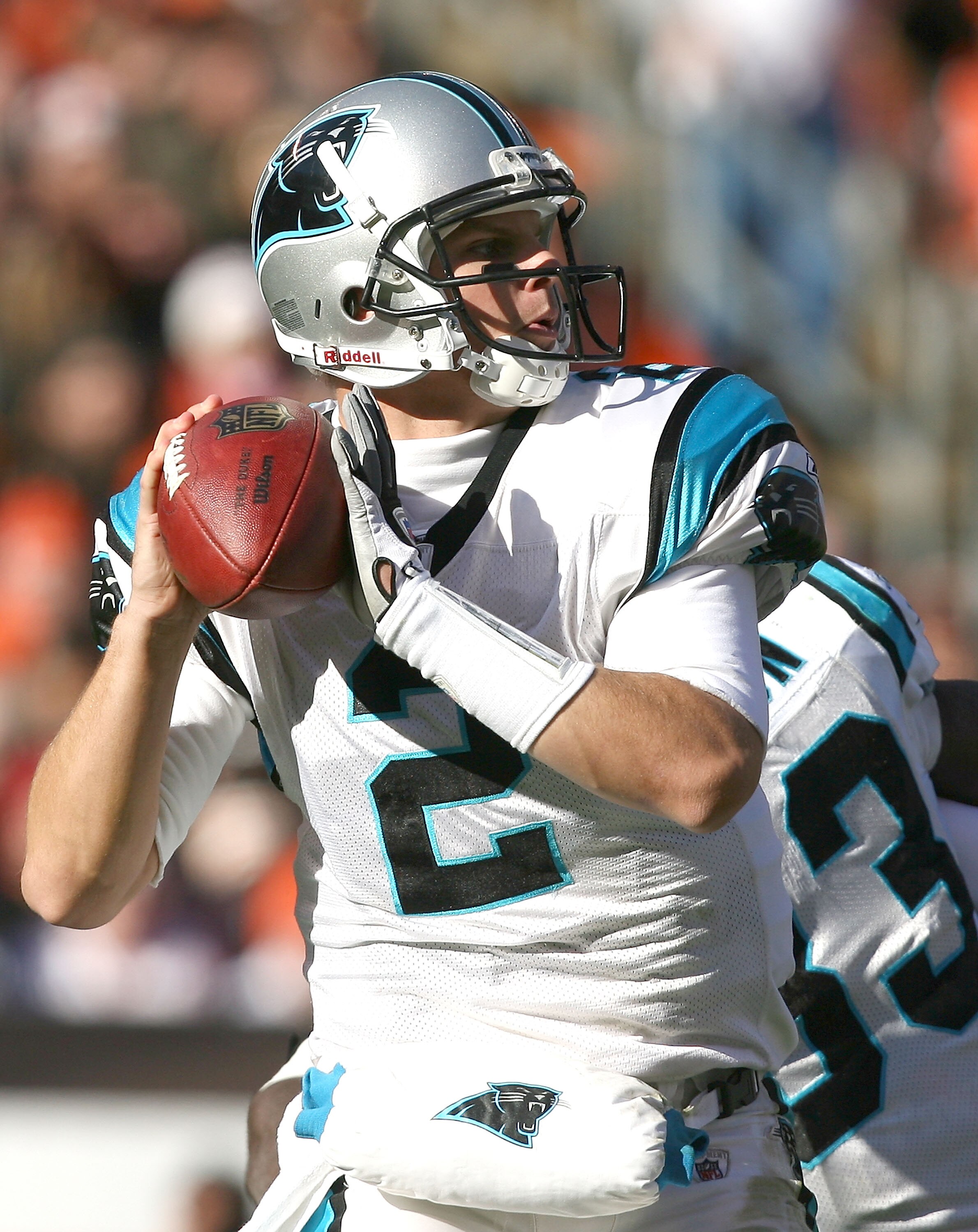 CLEVELAND - NOVEMBER 28:  Quarterback Jimmy Clausen #2 of the Carolina Panthers looks for a receiver against the Cleveland Browns at Cleveland Browns Stadium on November 28, 2010 in Cleveland, Ohio.  (Photo by Matt Sullivan/Getty Images)