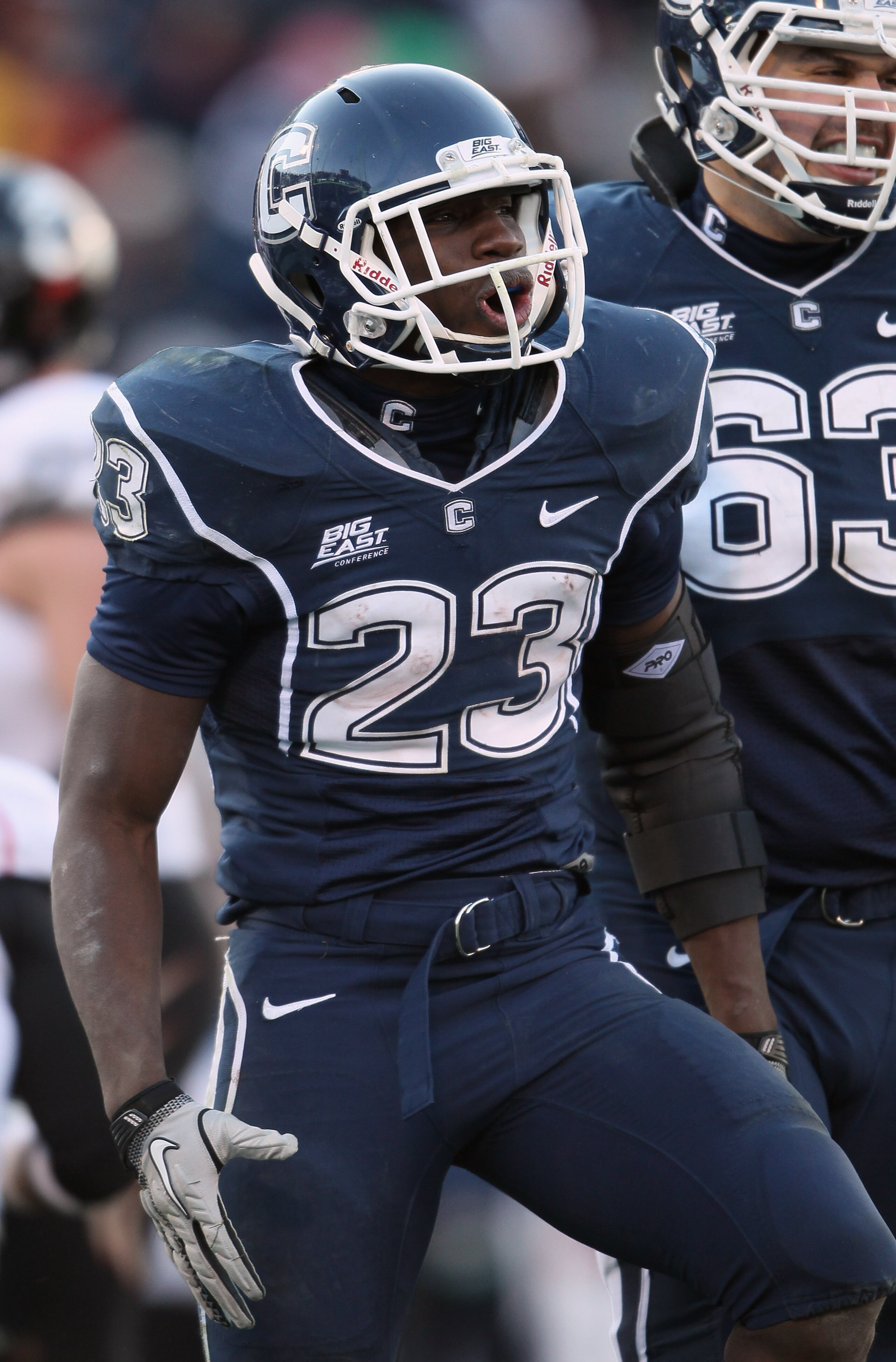 EAST HARTFORD, CT - NOVEMBER 27: Jordan Todman #23 of the Connecticut Huskies celebrates his touchdown in the fourth quarter against the Cincinnati Bearcats on November 27, 2010 at Rentschler Field in East Hartford, Connecticut. The Huskies defeated the EAST HARTFORD, CT - NOVEMBER 27: Jordan Todman #23 of the Connecticut Huskies celebrates his touchdown in the fourth quarter against the Cincinnati Bearcats on November 27, 2010 at Rentschler Field in East Hartford, Connecticut. The Huskies defeated the