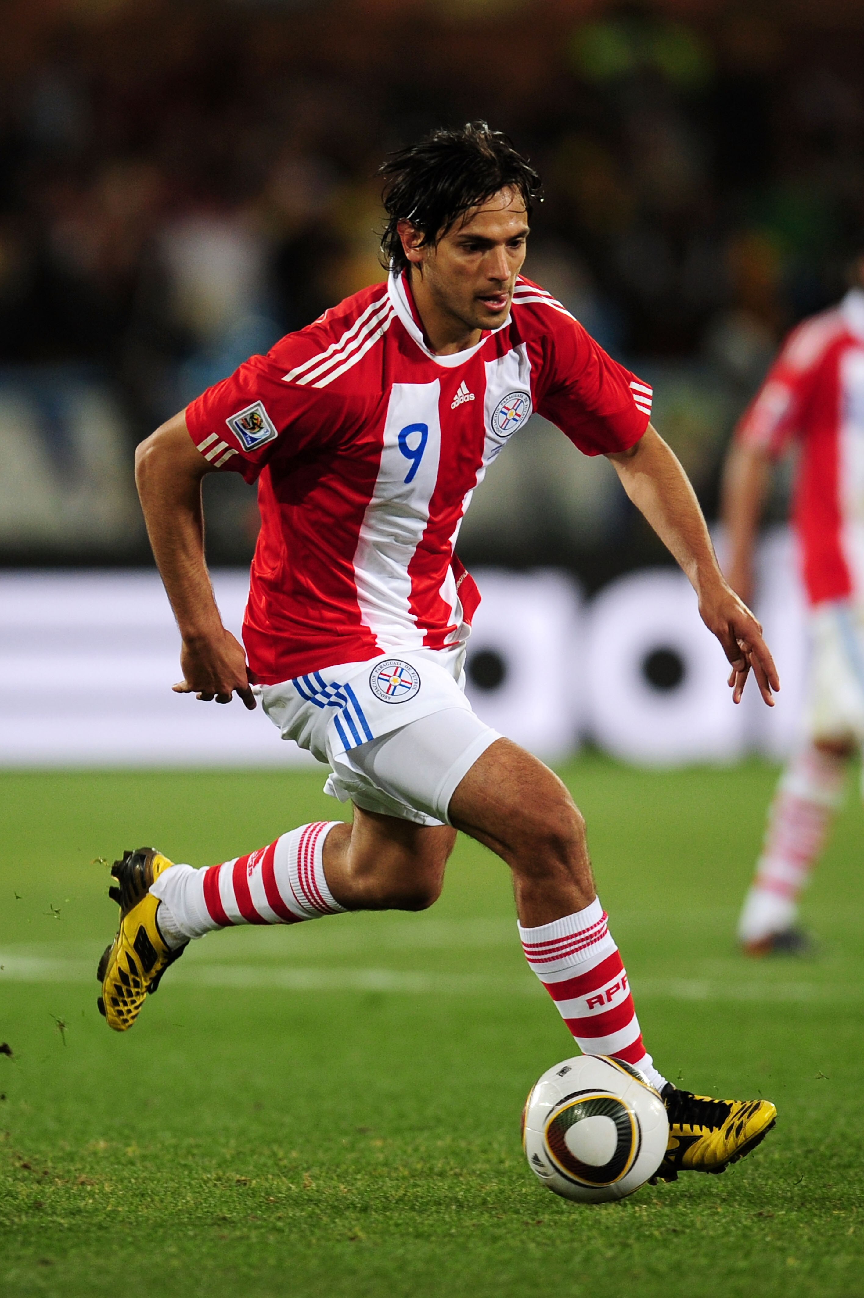 PRETORIA, SOUTH AFRICA - JUNE 29: Roque Santa Cruz of Paraguay in action during the 2010 FIFA World Cup South Africa Round of Sixteen match between Paraguay and Japan at Loftus Versfeld Stadium on June 29, 2010 in Pretoria, South Africa.  (Photo by Clive 