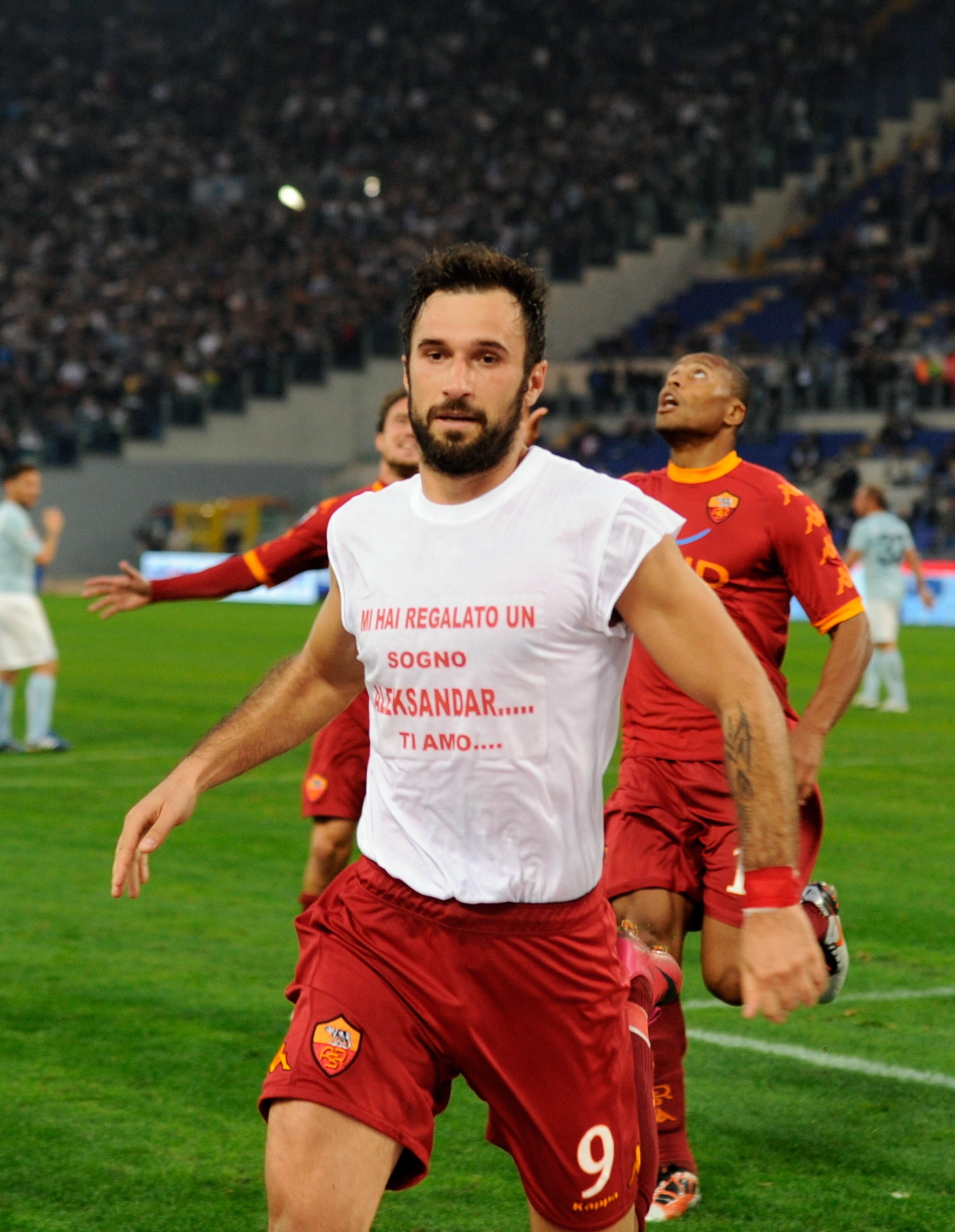 ROME - NOVEMBER 07:  Mirko Vucinic of AS Roma celebrates scoring the second goal during the Serie A match between Lazio and Roma at Stadio Olimpico on November 7, 2010 in Rome, Italy.  (Photo by Claudio Villa/Getty Images)