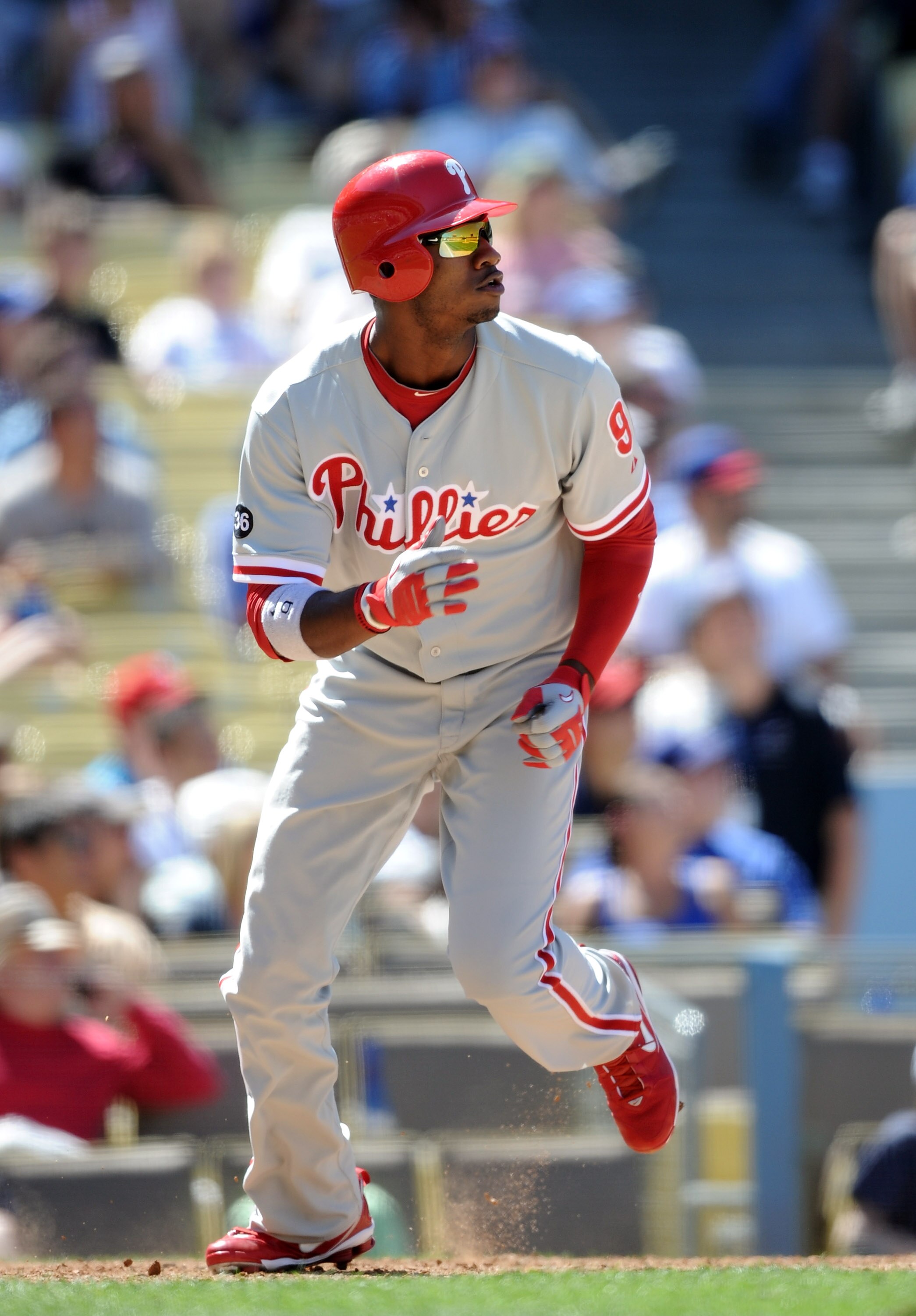 LOS ANGELES, CA - SEPTEMBER 01:  Dominic Brown #9 of the Philadelphia Phillies hits a double against the Los Angeles Dodgers at Dodger Stadium on September 1, 2010 in Los Angeles, California.  (Photo by Harry How/Getty Images)