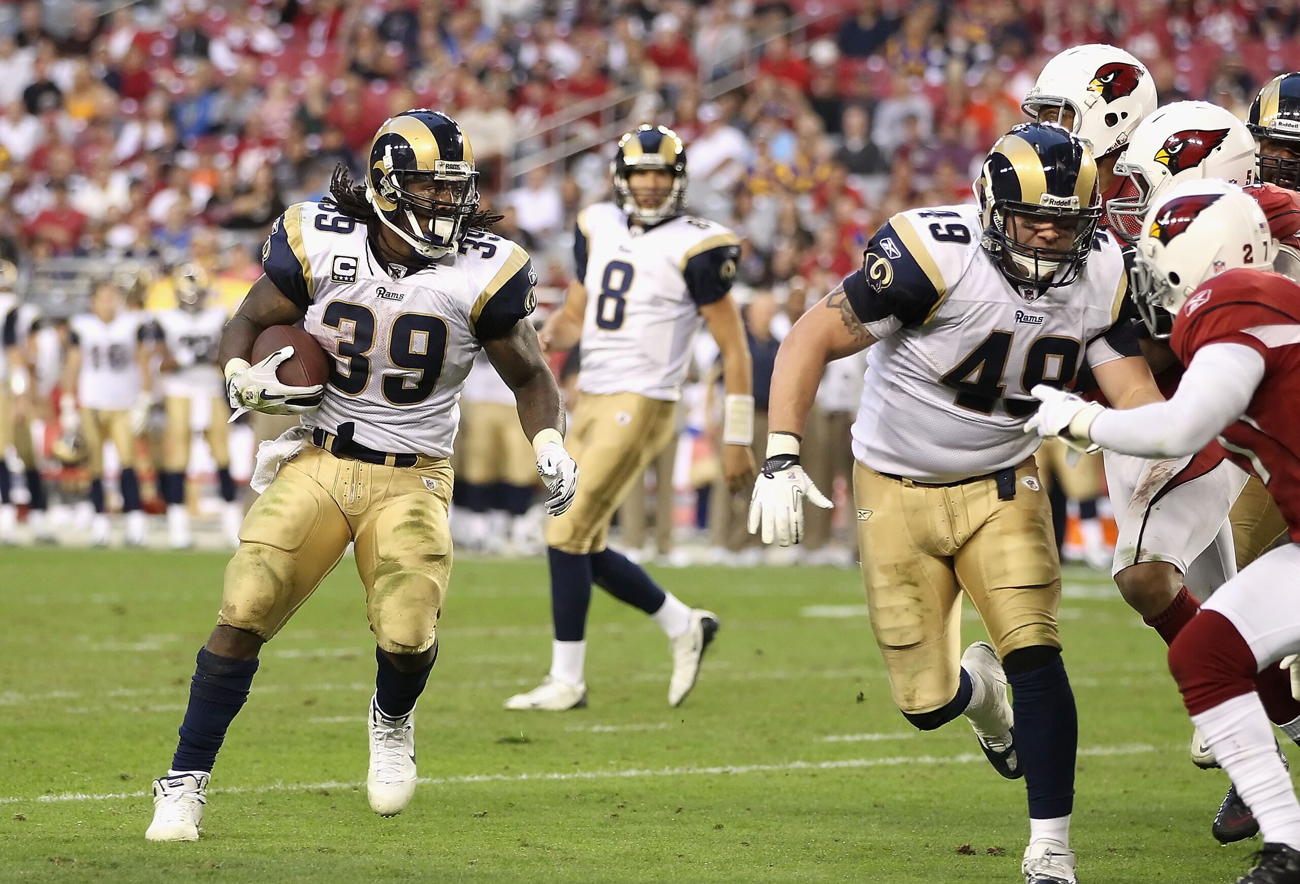 GLENDALE, AZ - DECEMBER 05:  Runningback Steven Jackson #39 of the St. Louis Rams rushes the football against the Arizona Cardinals during the NFL game at the University of Phoenix Stadium on December 5, 2010 in Glendale, Arizona. The Rams defeated the Ca