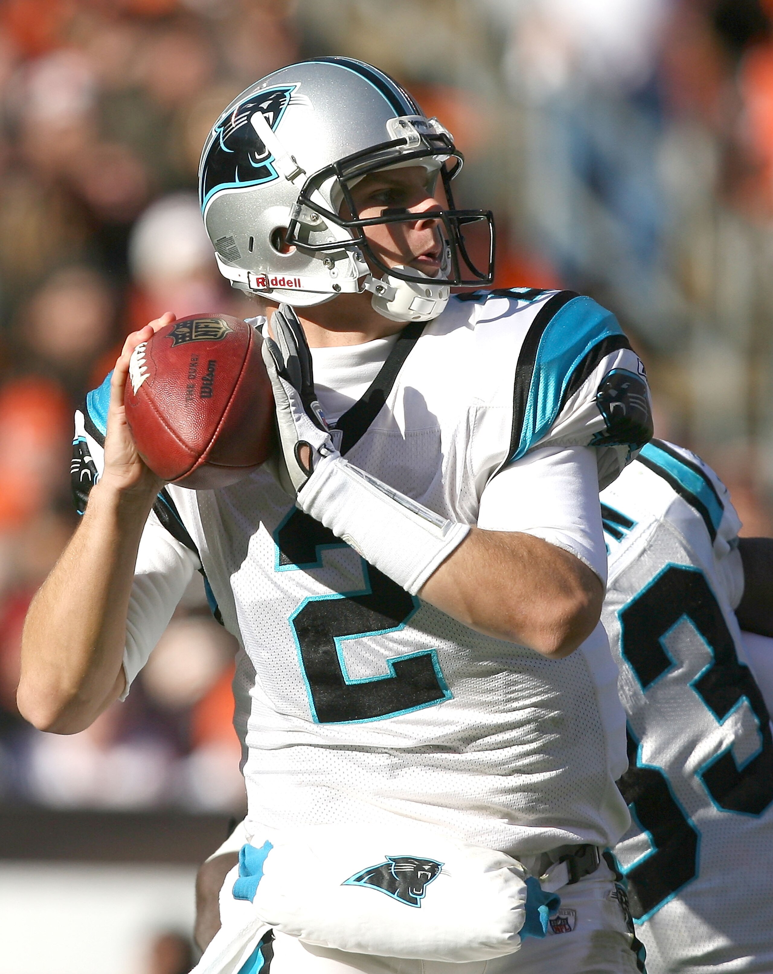 CLEVELAND - NOVEMBER 28:  Quarterback Jimmy Clausen #2 of the Carolina Panthers looks for a receiver against the Cleveland Browns at Cleveland Browns Stadium on November 28, 2010 in Cleveland, Ohio.  (Photo by Matt Sullivan/Getty Images)