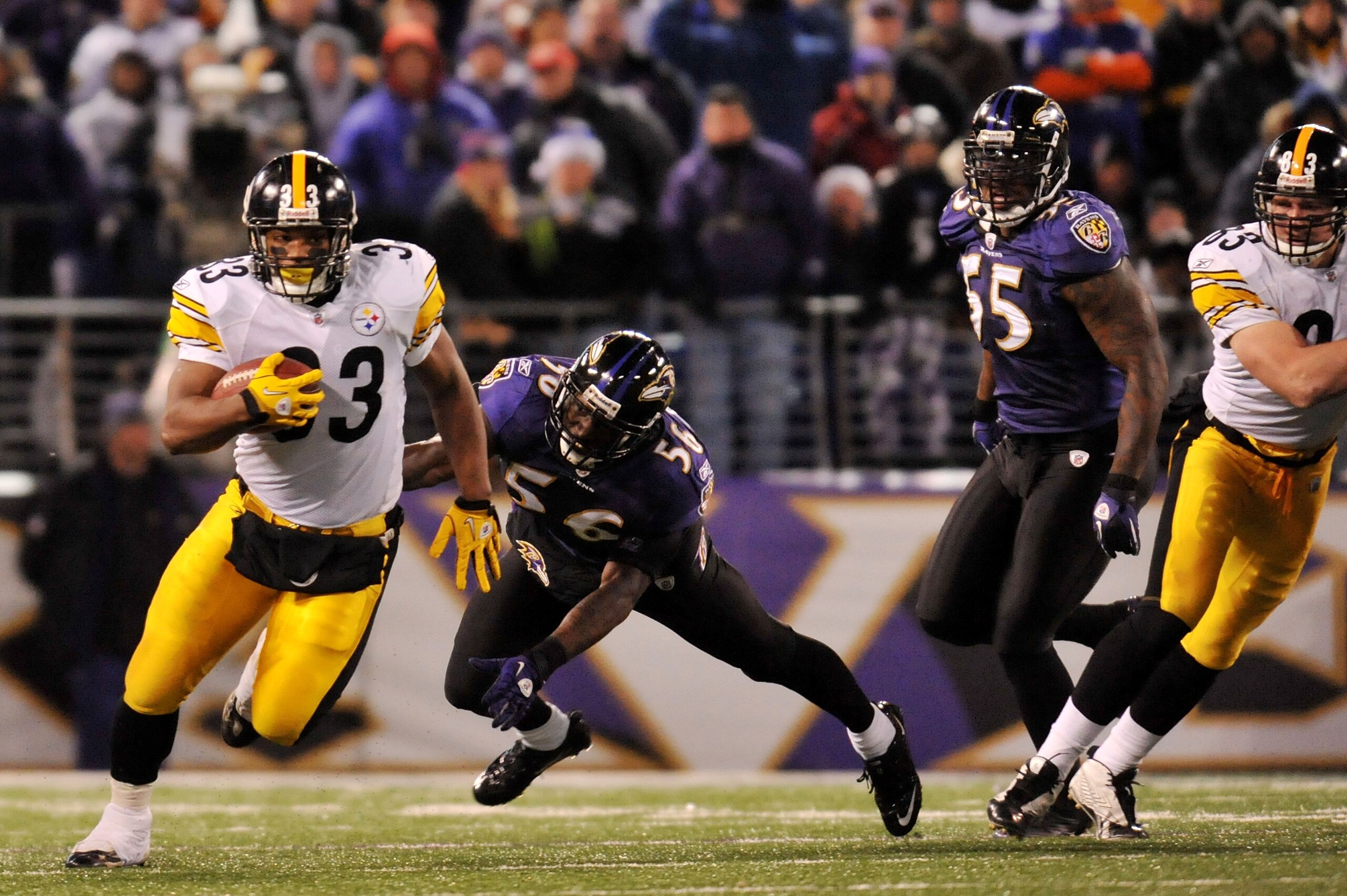 BALTIMORE, MD - DECEMBER 05:  Running back Isaac Redman #33 of the Pittsburgh Steelers runs the ball against linebacker Tavares Gooden #56 of the Baltimore Ravens during the second quarter of the game at M&T Bank Stadium on December 5, 2010 in Baltimore,