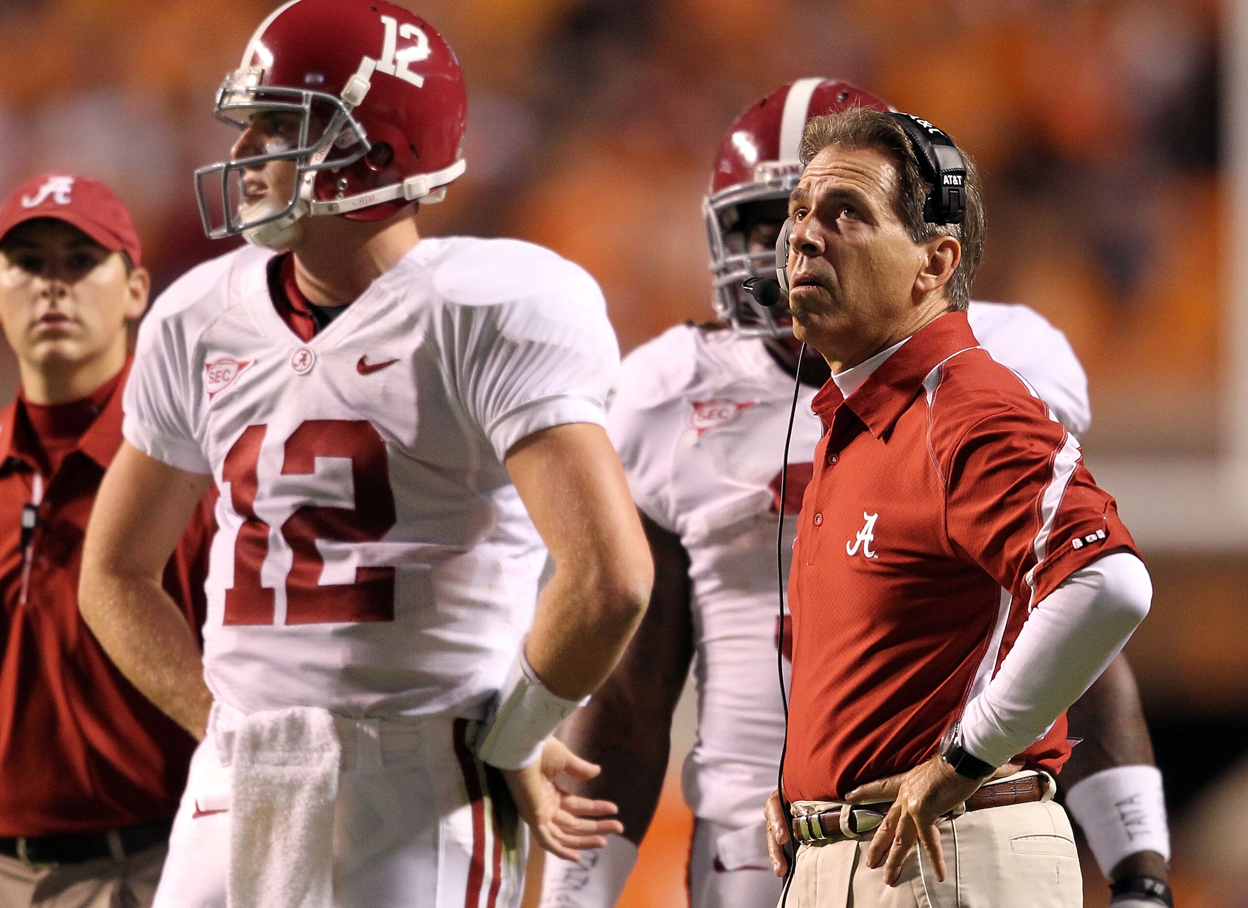 KNOXVILLE, TN - OCTOBER 23: Greg McElroy #12 and Nick Saban the Head Coach of the Alabama Crimson Tide are pictured during a timeout in the SEC game against the Tennessee Volunteers at Neyland Stadium on October 23, 2010 in Knoxville, Tennessee. (Photo b KNOXVILLE, TN - OCTOBER 23: Greg McElroy #12 and Nick Saban the Head Coach of the Alabama Crimson Tide are pictured during a timeout in the SEC game against the Tennessee Volunteers at Neyland Stadium on October 23, 2010 in Knoxville, Tennessee. (Photo b