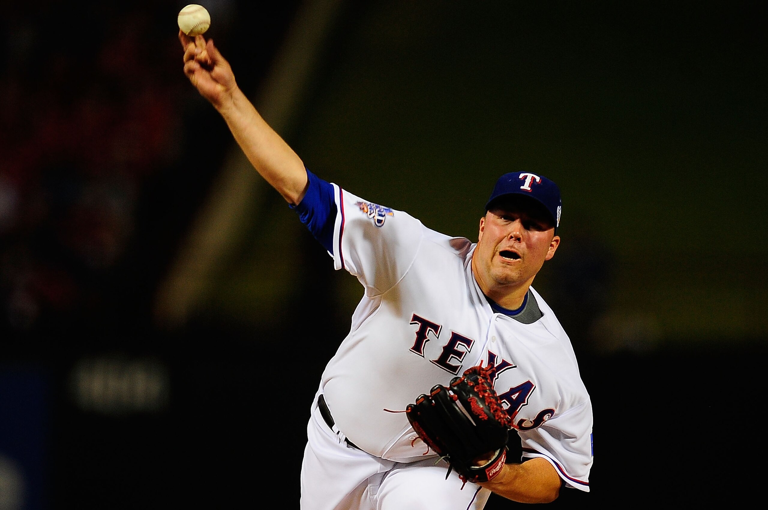 ARLINGTON, TX - OCTOBER 31:  Tommy Hunter #35 of the Texas Rangers pitches against the San Francisco Giants in Game Four of the 2010 MLB World Series at Rangers Ballpark in Arlington on October 31, 2010 in Arlington, Texas.  (Photo by Matthew Campbell-Poo