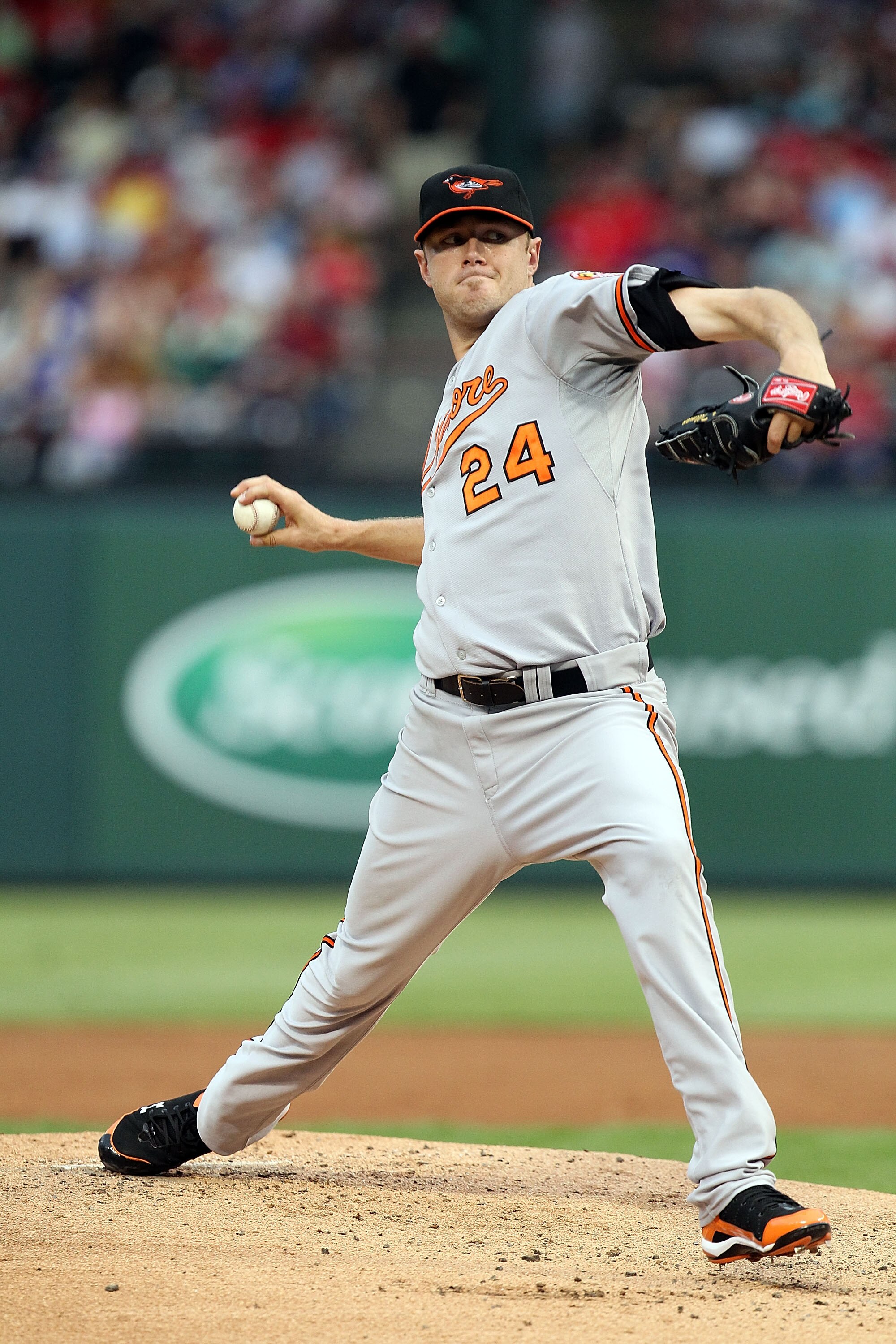 ARLINGTON, TX - JULY 10:  Pitcher Chris Tillman #24 of the Baltimore Orioles throws against the Texas Rangers on July 10, 2010 at Rangers Ballpark in Arlington, Texas.  (Photo by Ronald Martinez/Getty Images)