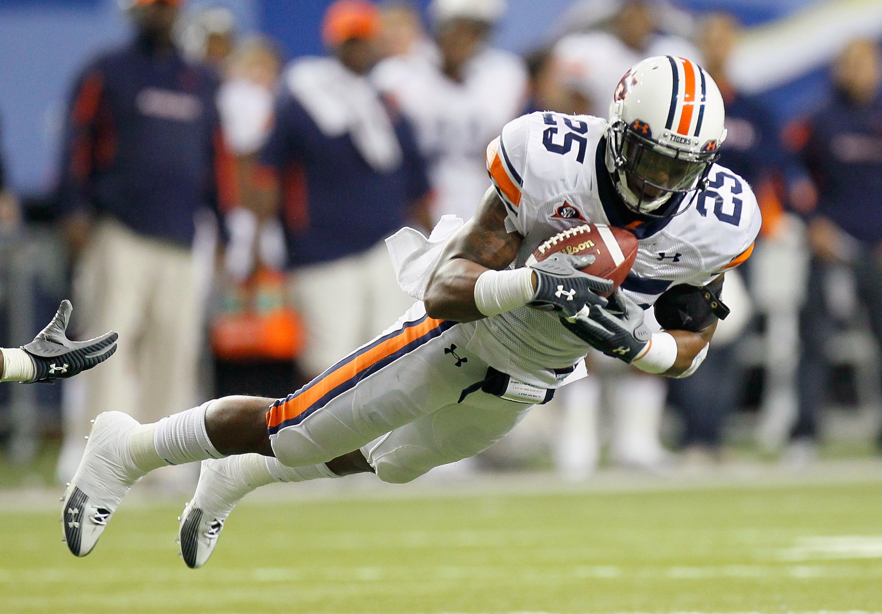 ATLANTA, GA - DECEMBER 04:  Daren Bates #25 of the Auburn Tigers intercepts this pass by the South Carolina Gamecocks during the 2010 SEC Championship at Georgia Dome on December 4, 2010 in Atlanta, Georgia.  (Photo by Kevin C. Cox/Getty Images)