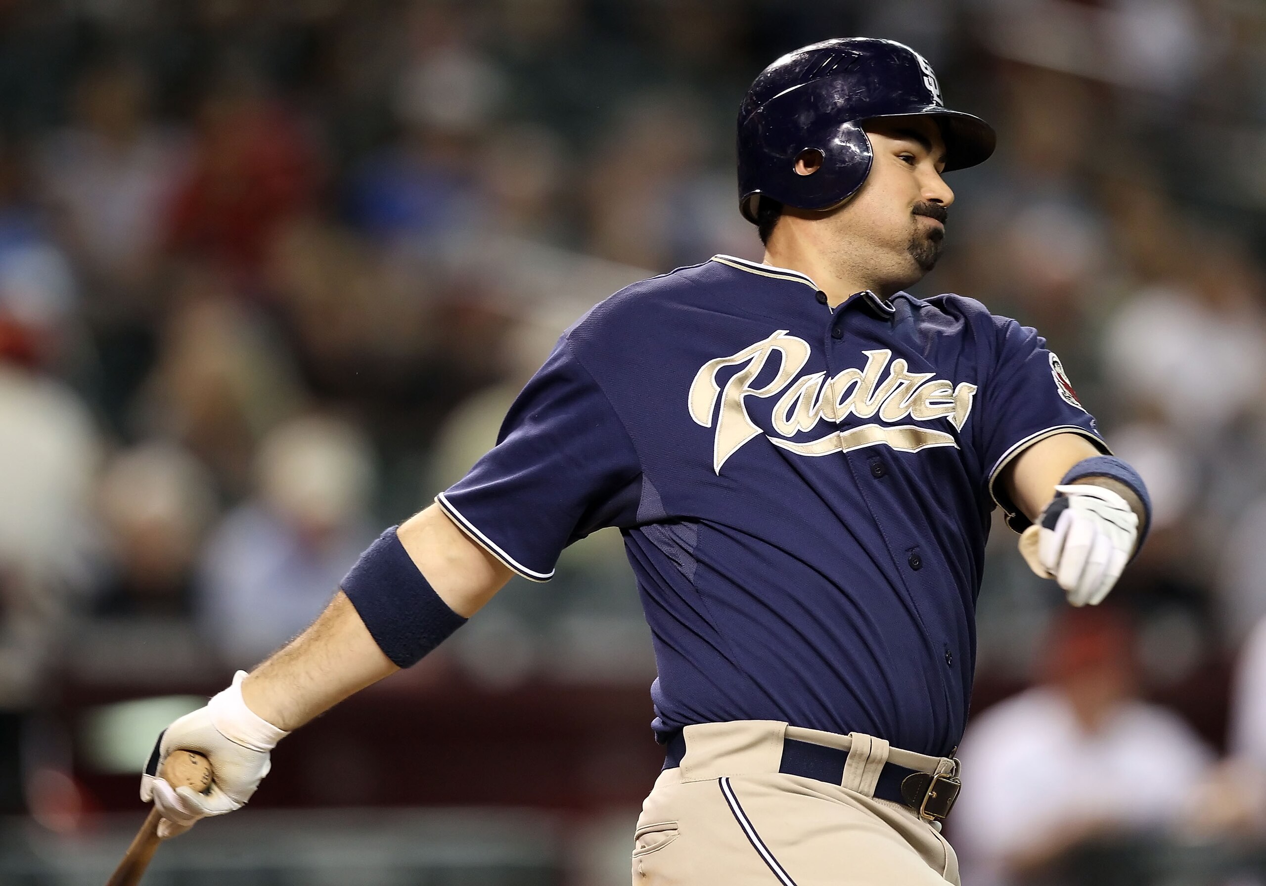 PHOENIX - AUGUST 30:  Adrian Gonzalez #23 of the San Diego Padres bats against the Arizona Diamondbacks during the Major League Baseball game at Chase Field on August 30, 2010 in Phoenix, Arizona. The Diamondbacks defeated the Padres 7-2.  (Photo by Chris