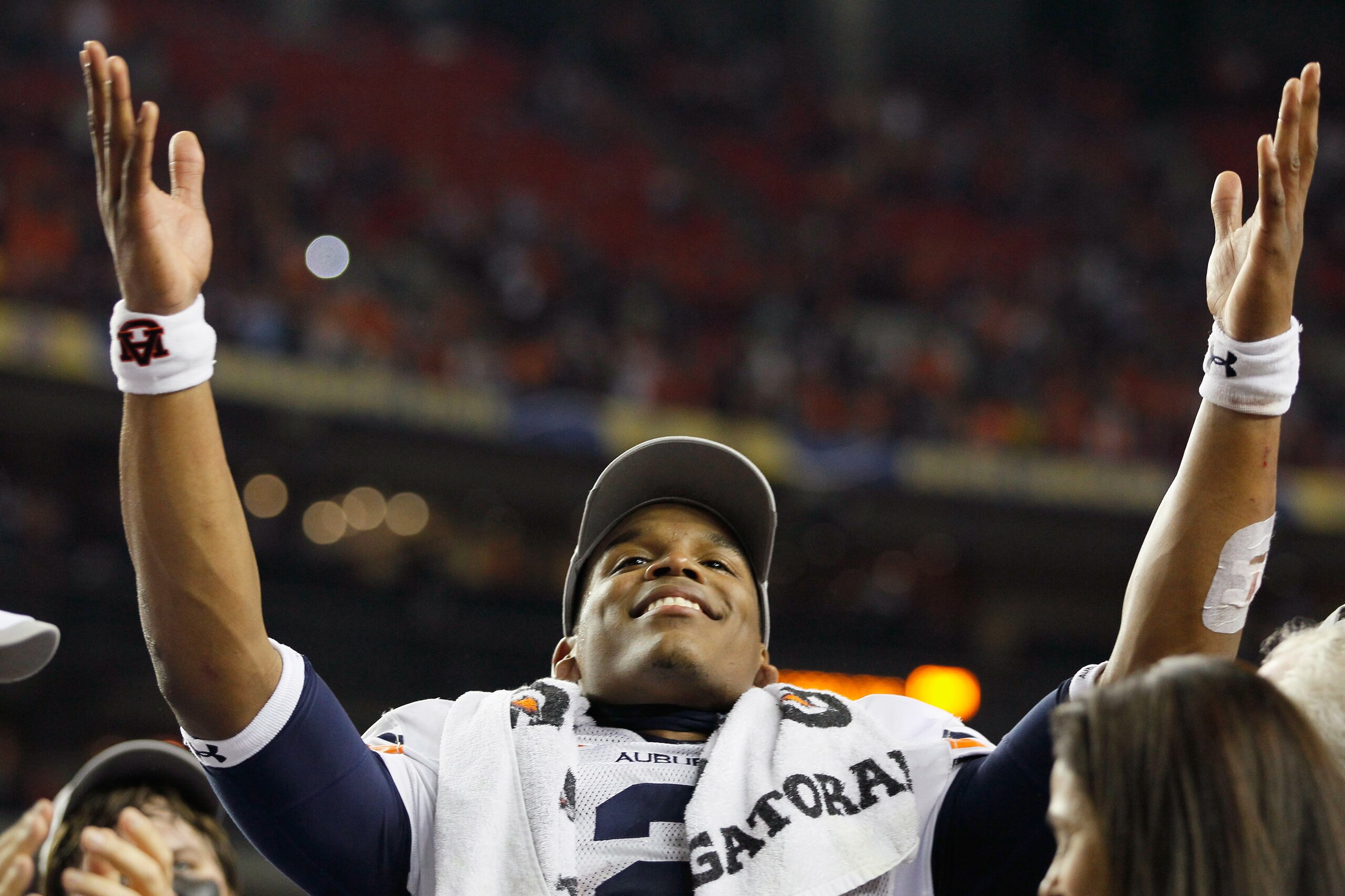 ATLANTA, GA - DECEMBER 04:  Quarterback Cam Newton #2 of the Auburn Tigers celebrates after their 56-17 win over the South Carolina Gamecocks during the 2010 SEC Championship at Georgia Dome on December 4, 2010 in Atlanta, Georgia.  (Photo by Kevin C. Cox