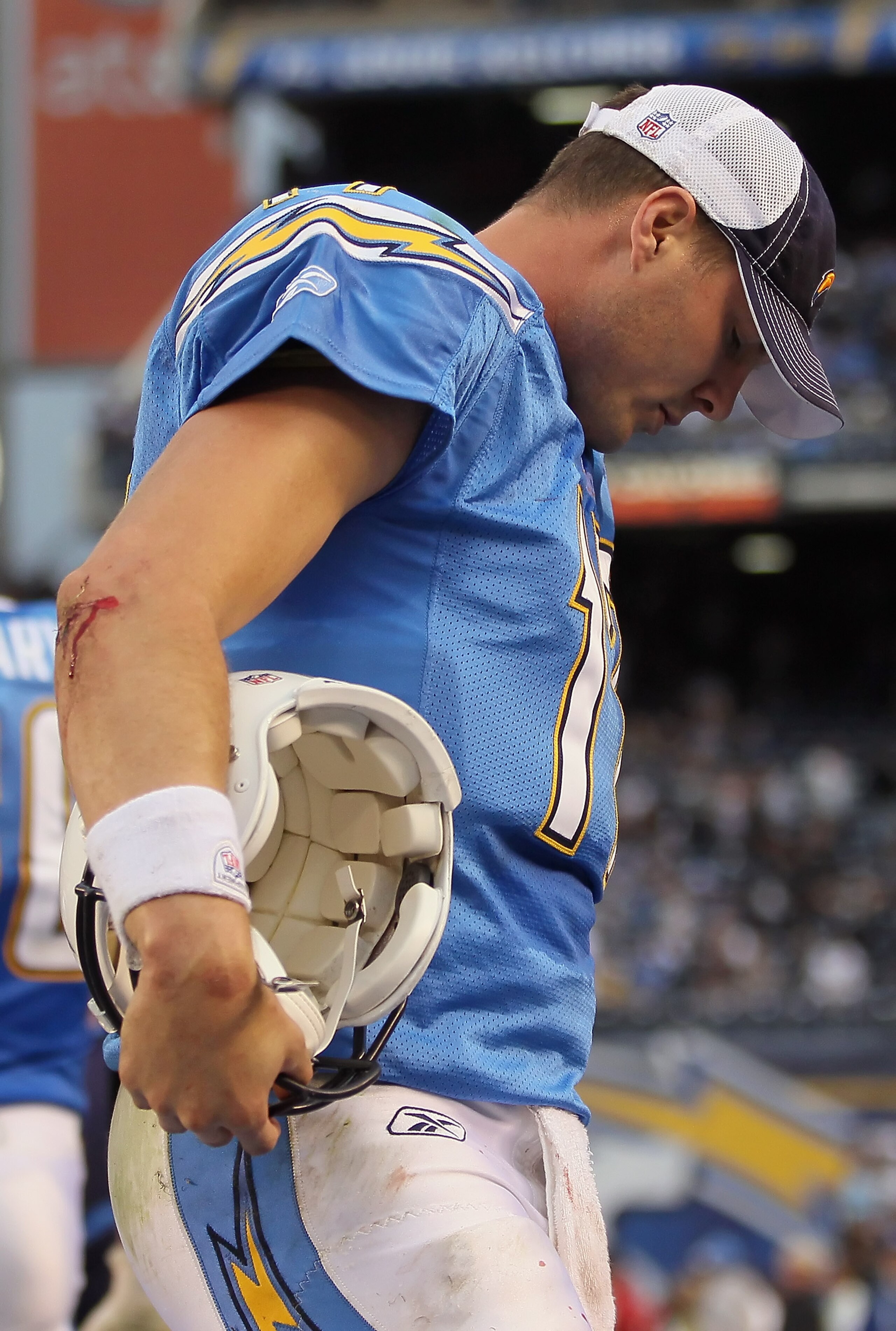 SAN DIEGO - DECEMBER 05:  Quarterback Philip Rivers #17 of the San Diego Chargers is seen dejected on the sideline in the closing minutes of the fourth quarter against the Oakland Raiders at Qualcomm Stadium on December 5, 2010 in San Diego, California. T