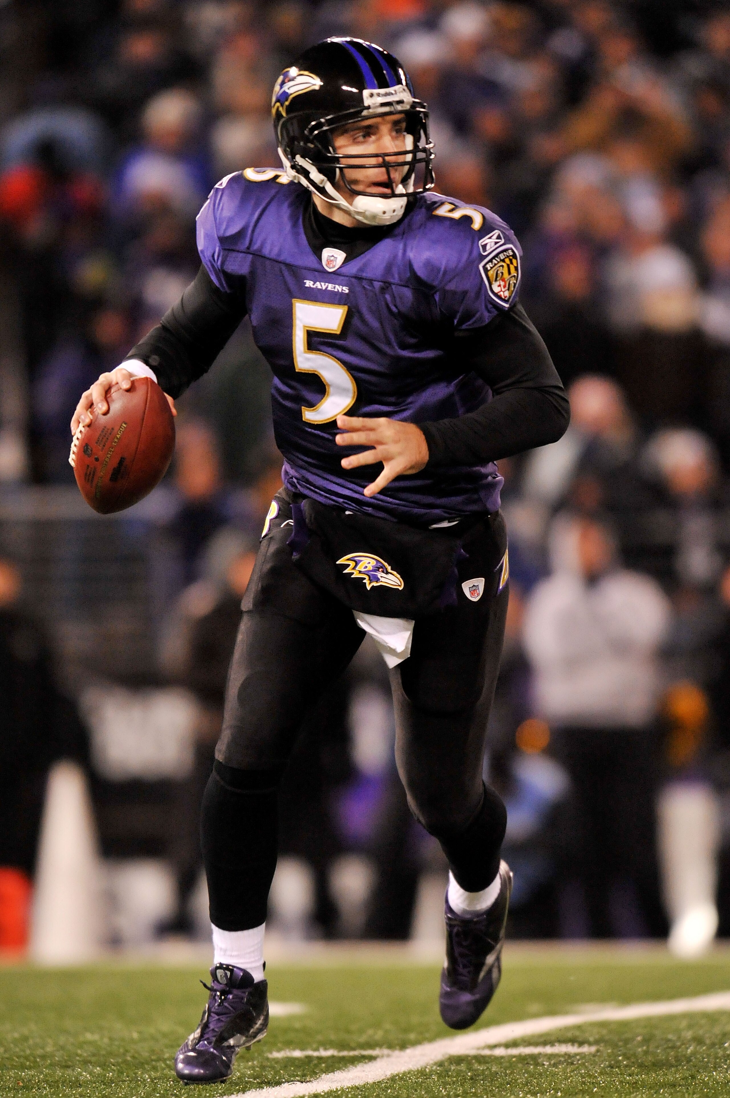 BALTIMORE, MD - DECEMBER 05:  Quarterback Joe Flacco #5 of the Baltimore Ravens looks to pass against the Pittsburgh Steelers during the first half of the game at M&T Bank Stadium on December 5, 2010 in Baltimore, Maryland.  (Photo by Larry French/Getty I