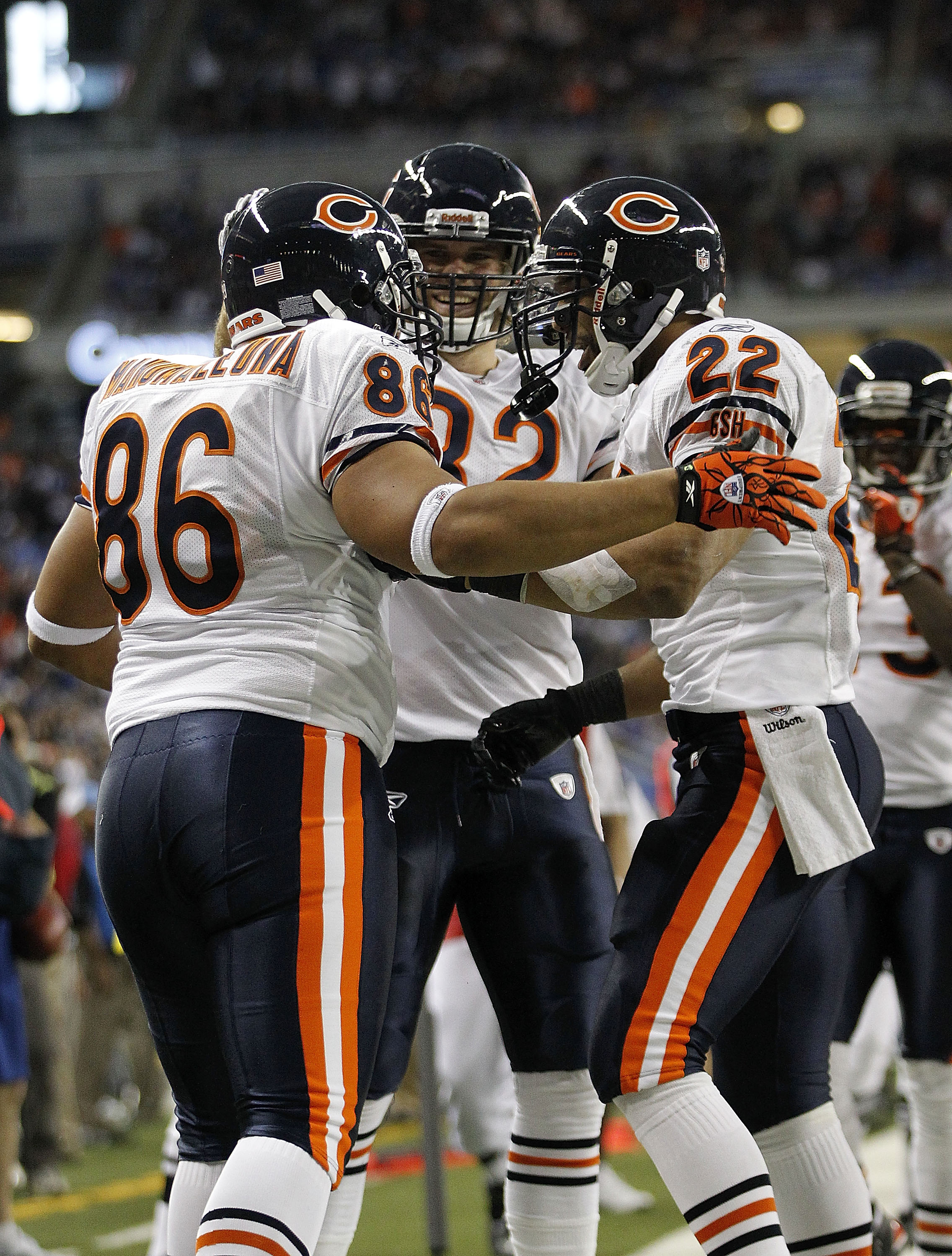 DETROIT - DECEMBER 05: Brandon Manumaleuna #86 of the Chicago Bears celebrates a fourth quarter touchdown with teammates Greg Olsen #82 and Matt Forte #22 during the game against the Detroit Lions at Ford Field on December 5, 2010 in Detroit, Michigan. Th