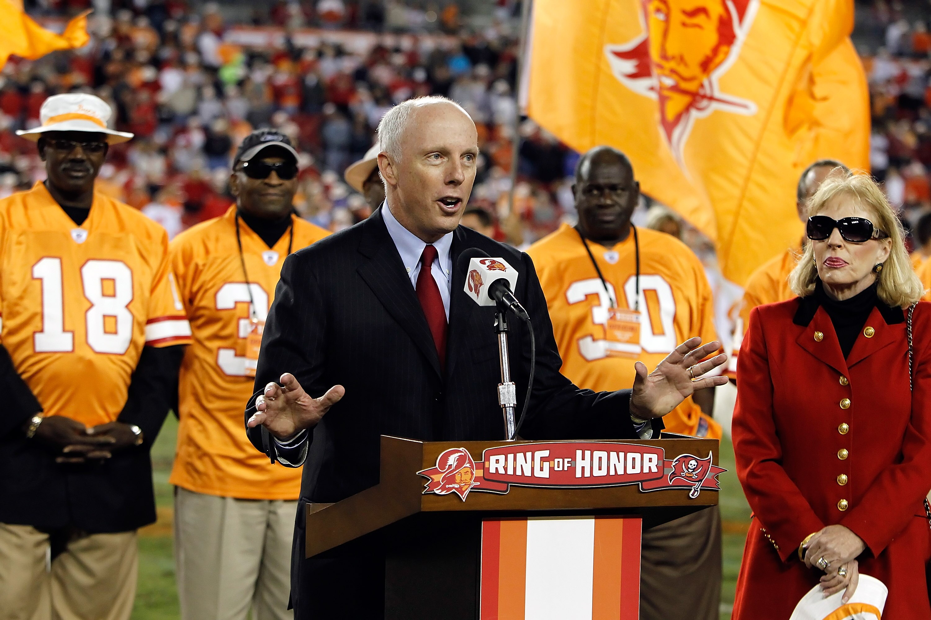 TAMPA, FL - DECEMBER 05:  Rich McKay, president of the Atlanta Falcons, addresses the crowd as his late father was inducted into the Tampa Bay Buccaneers Ring of Honor during the game at Raymond James Stadium on December 5, 2010 in Tampa, Florida.  (Photo
