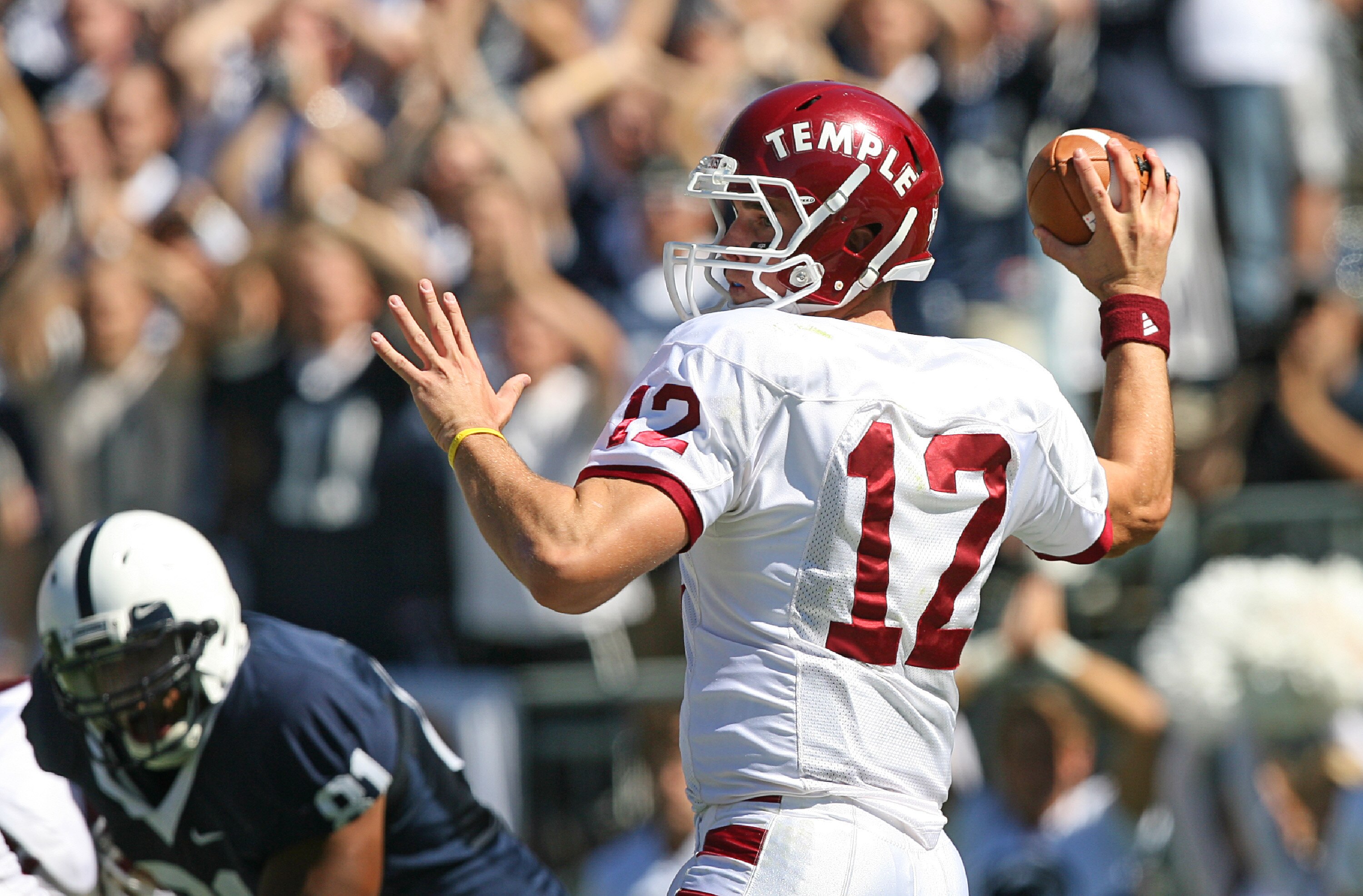 STATE COLLEGE, PA - SEPTEMBER 19: Quarterback Vaughn Charlton #12 of the Temple Owls throws a pass during a game against the Penn State Nittany Lions on September 19, 2009 at Beaver Stadium in State College, Pennsylvania. (Photo by Hunter Martin/Getty Ima