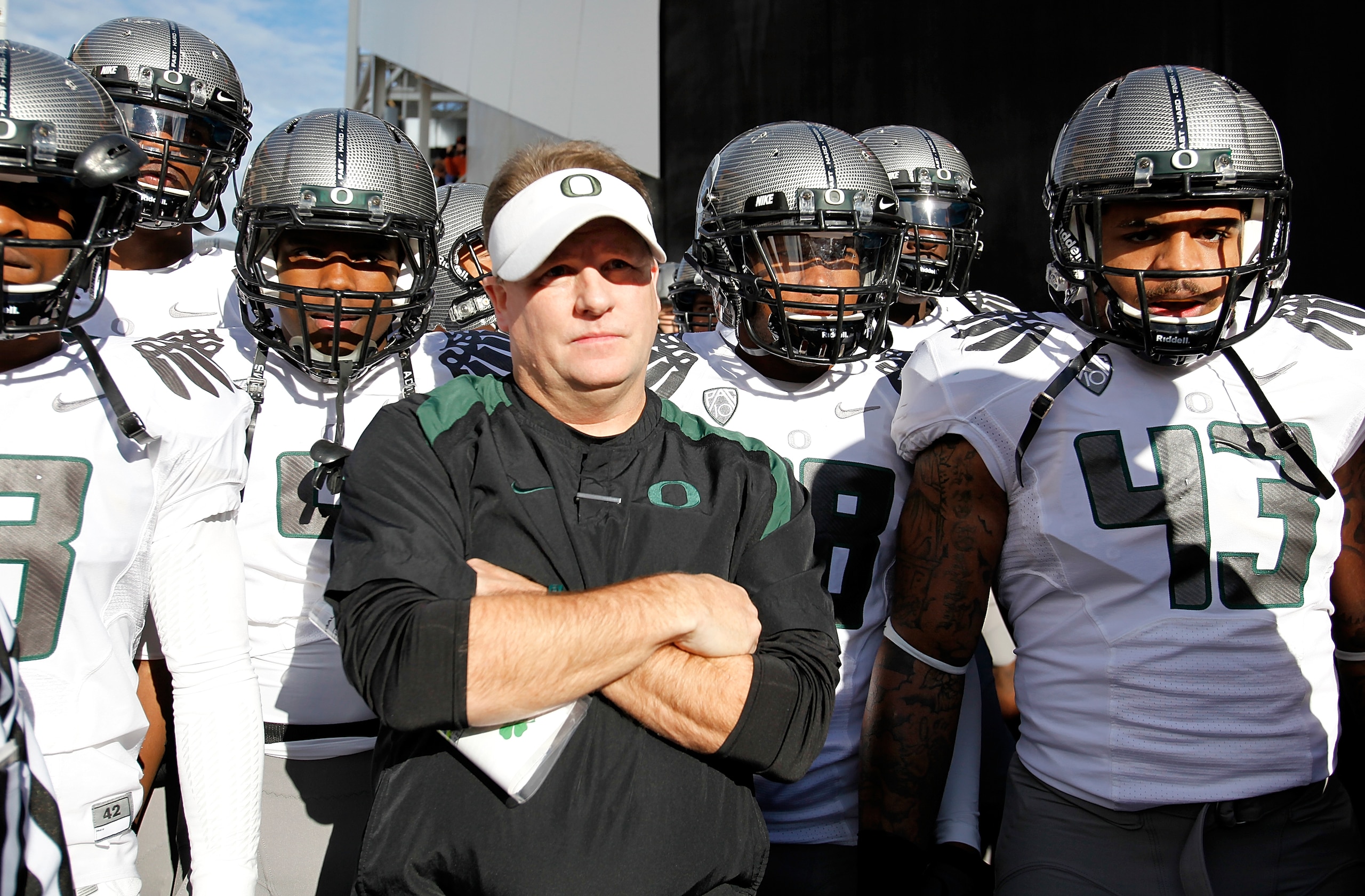 CORVALLIS, OR - DECEMBER 04:  Head Coach Chip Kelly of the Oregon Ducks prepares with his team before the game against the Oregon State Beavers during the 114th Civil War on December 4, 2010 at the Reser Stadium in Corvallis, Oregon.  (Photo by Jonathan F