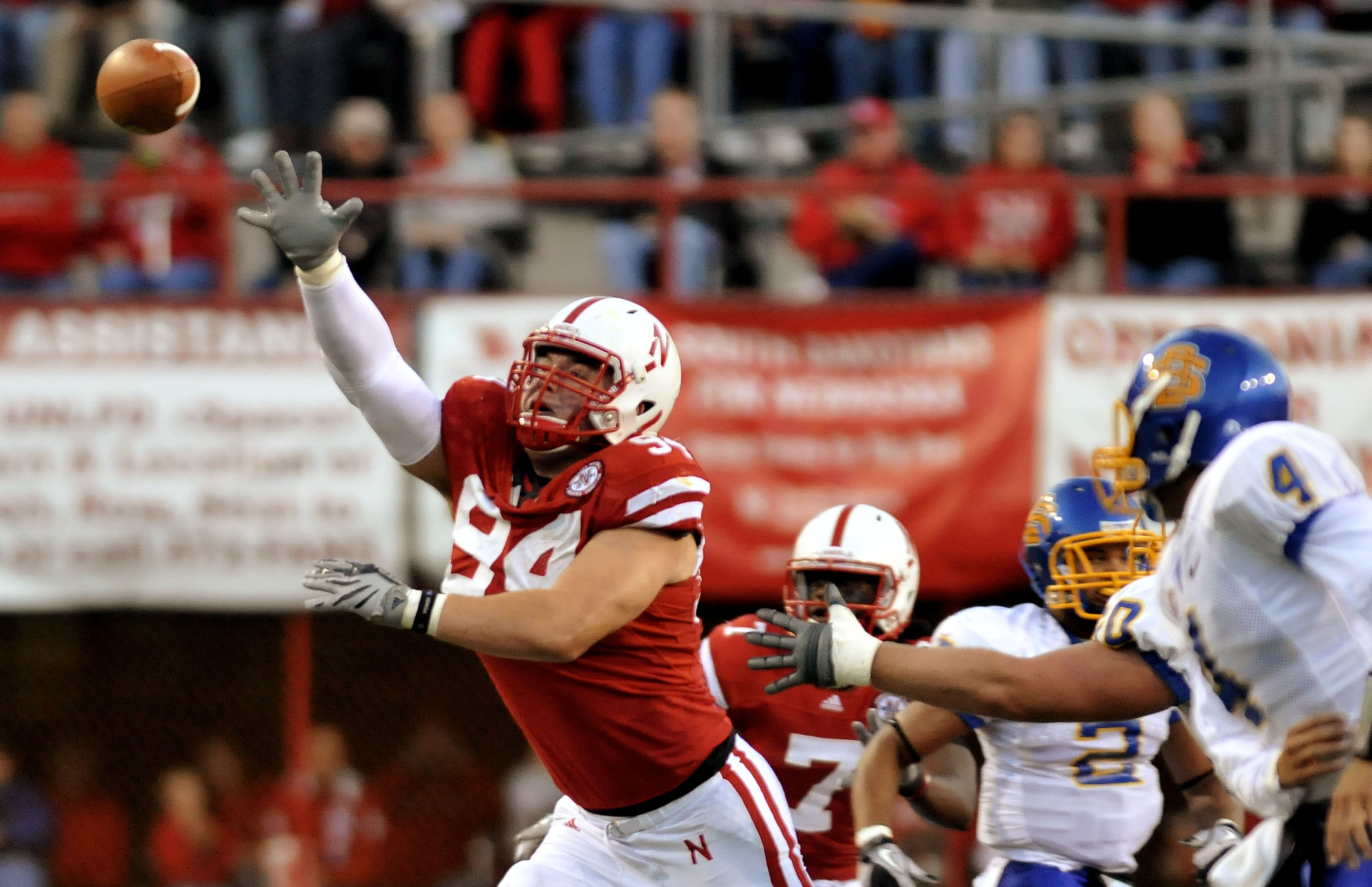 LINCOLN, NE - SEPTEMBER 25: Defensive tackle Jared Crick #94 of the Nebraska Cornhuskers tries to bat down a pass from  quarterback Thomas O'Brien #4 of the South Dakota State Jackrabbits during first half action of their game at Memorial Stadium on Septe
