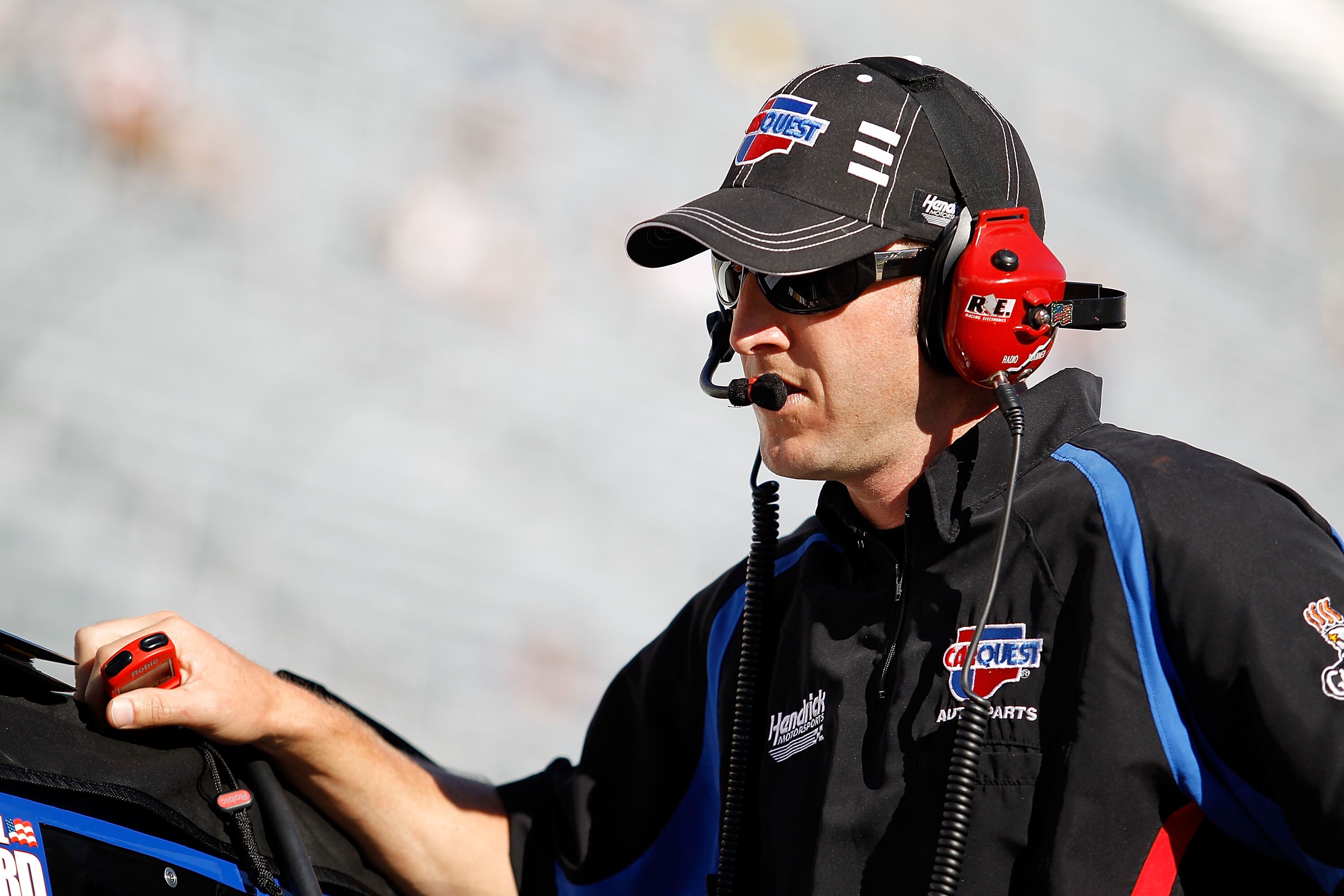 BRISTOL, TN - AUGUST 20:  Alan Gustafson, crew chief of the #5 CARQUEST Auto Parts Chevrolet, stands on the grid during qualifying for the NASCAR Sprint Cup Series IRWIN Tools Night Race at Bristol Motor Speedway on August 20, 2010 in Bristol, Tennessee.