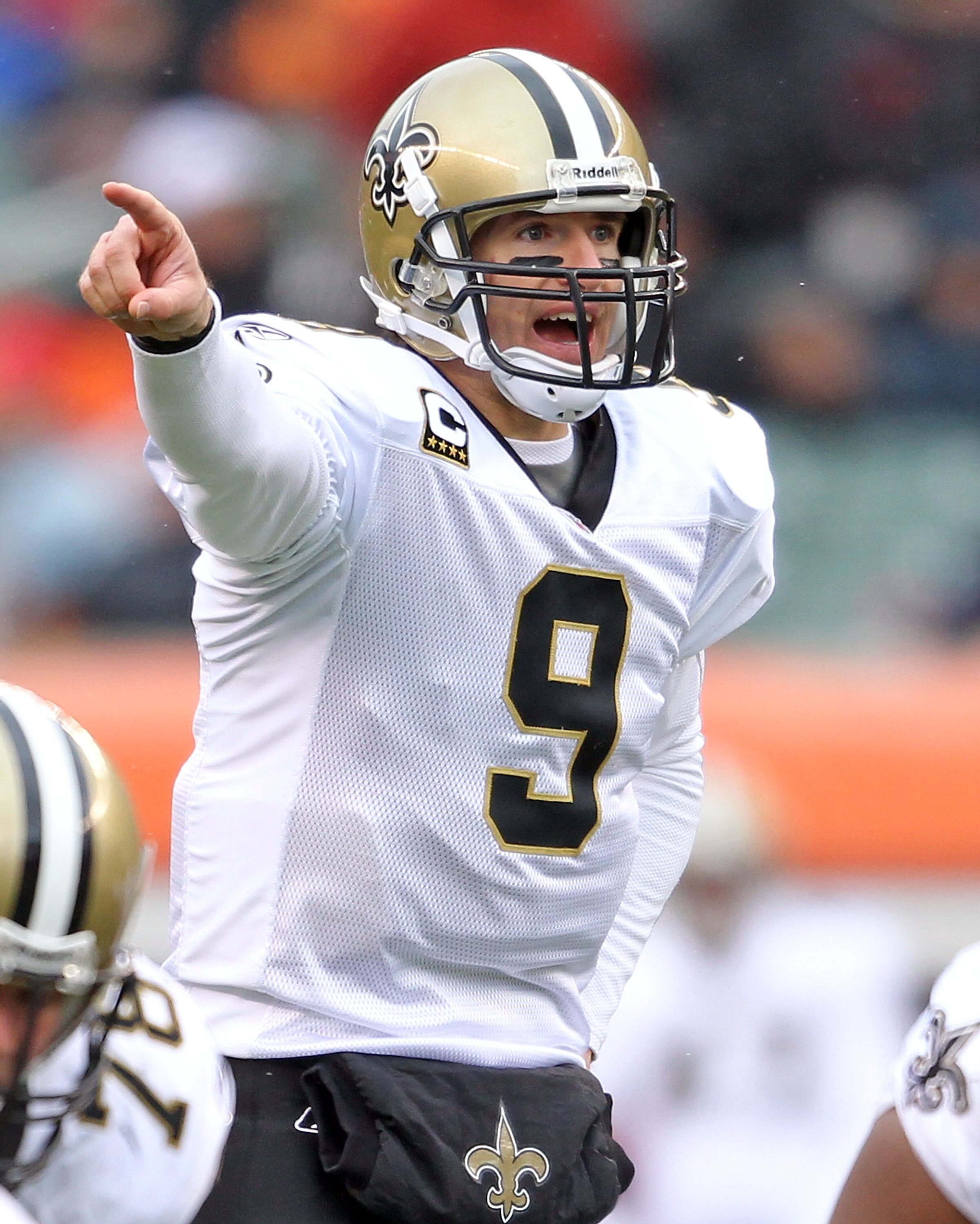 CINCINNATI, OH - DECEMBER 05:  Dree Brees #9 of the New Orleans Saints gives instructions to his team during the NFL game against the Cincinnati Bengals at Paul Brown Stadium on December 5, 2010 in Cincinnati, Ohio.  The Saints won 34-30.  (Photo by Andy