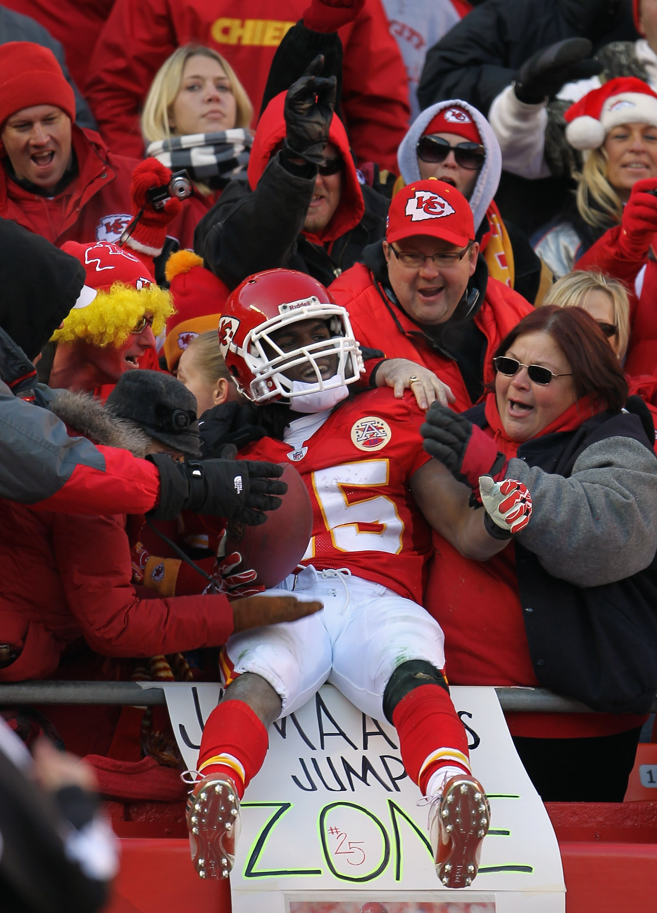 KANSAS CITY, MO - DECEMBER 05:  Jamaal Charles #25 of the Kansas City Chiefs celebrates by jumping into the crowd after scoring a touchdown that was eventually called back during the game against the Denver Broncos on December 5, 2010 at Arrowhead Stadium