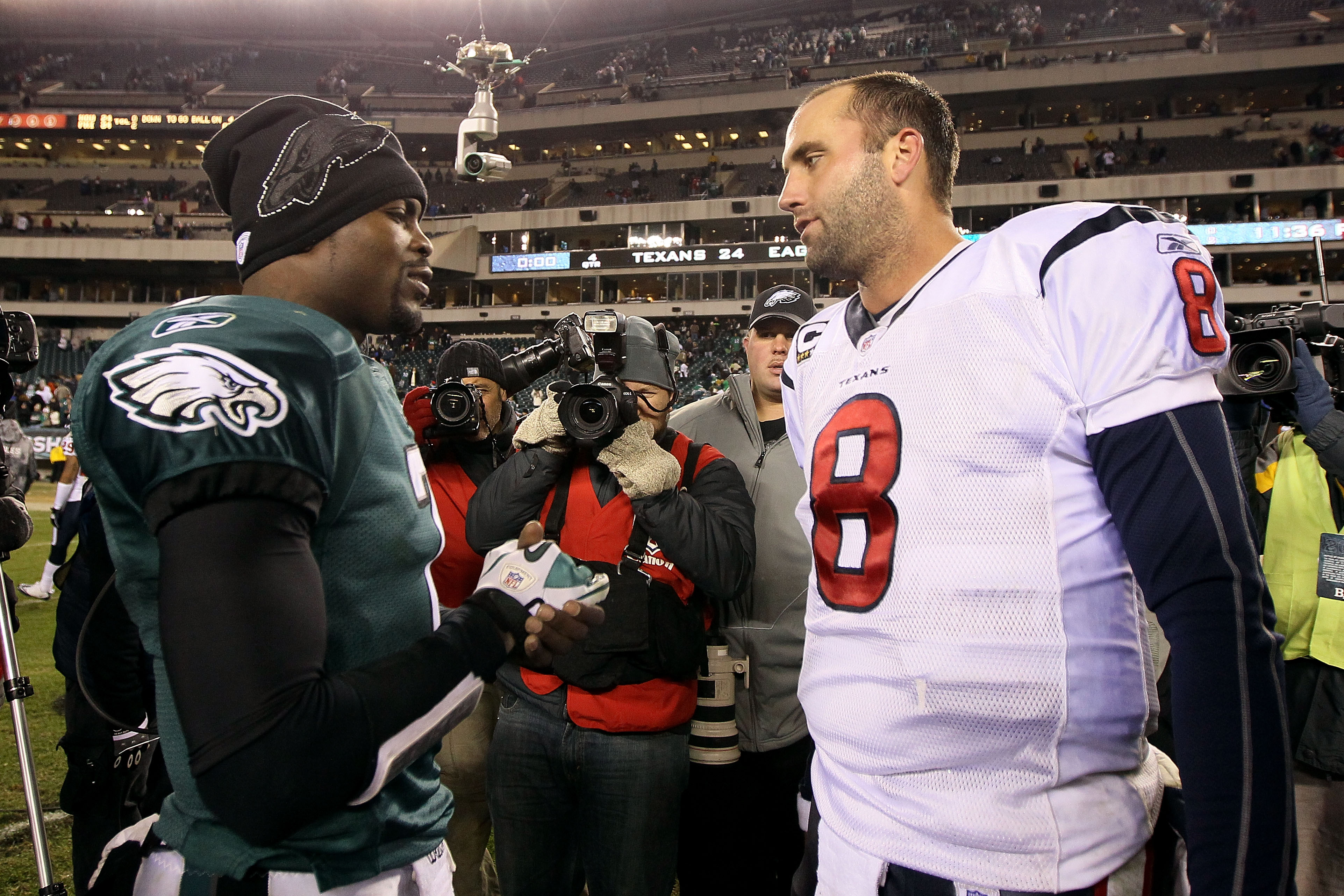 PHILADELPHIA, PA - DECEMBER 02:  Michael Vick #7 of the Philadelphia Eagles talks with Matt Schaub #8 of the Houston Texans after the Eagles won 34-24 at Lincoln Financial Field on December 2, 2010 in Philadelphia, Pennsylvania.  (Photo by Jim McIsaac/Get