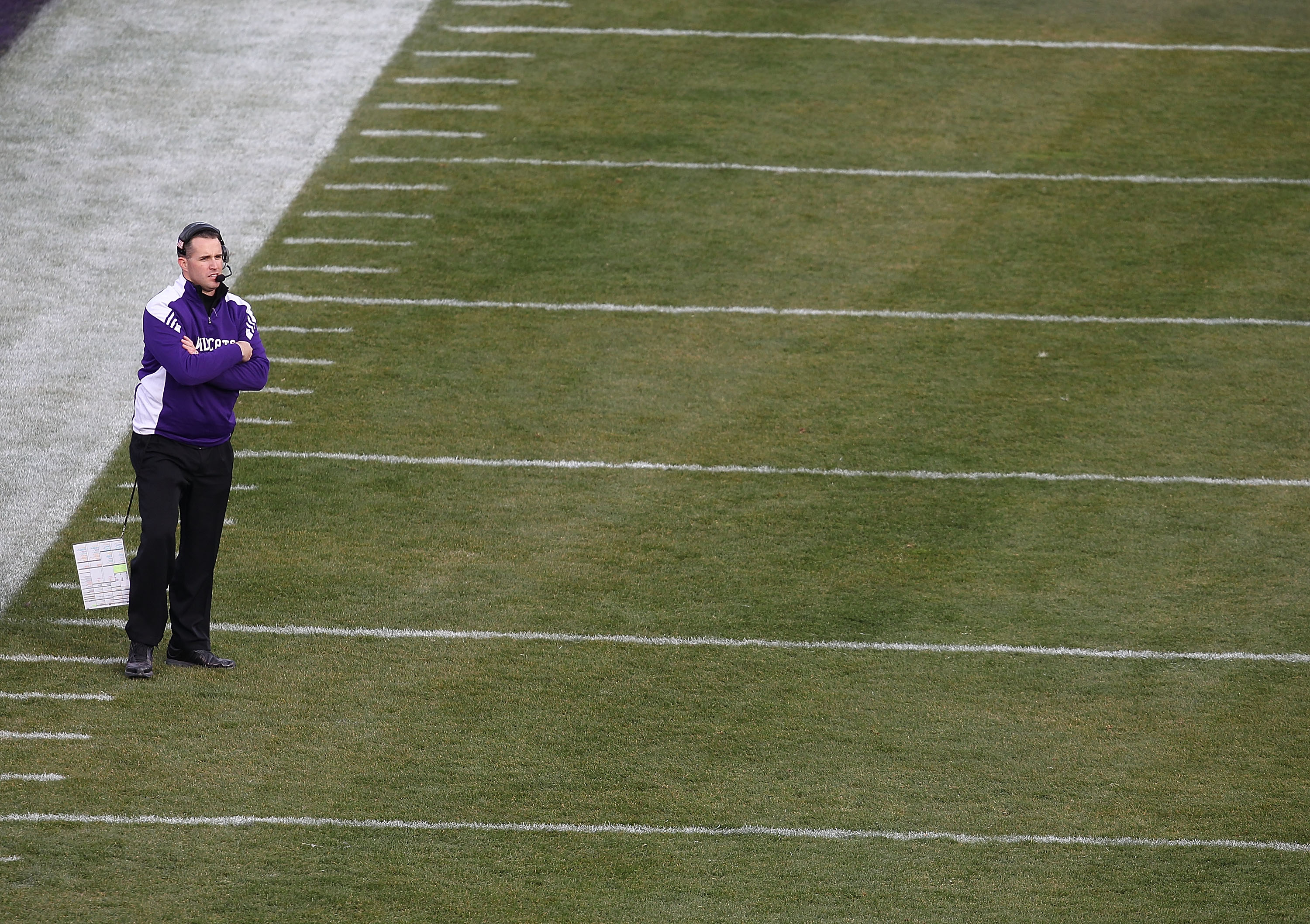 CHICAGO - NOVEMBER 20: Head coach Pat Fitzgerald of the Northwestern Wildcats watches as his team takes on the Illinois Fighting Illini during a game played at Wrigley Field on November 20, 2010 in Chicago, Illinois. (Photo by Jonathan Daniel/Getty Images