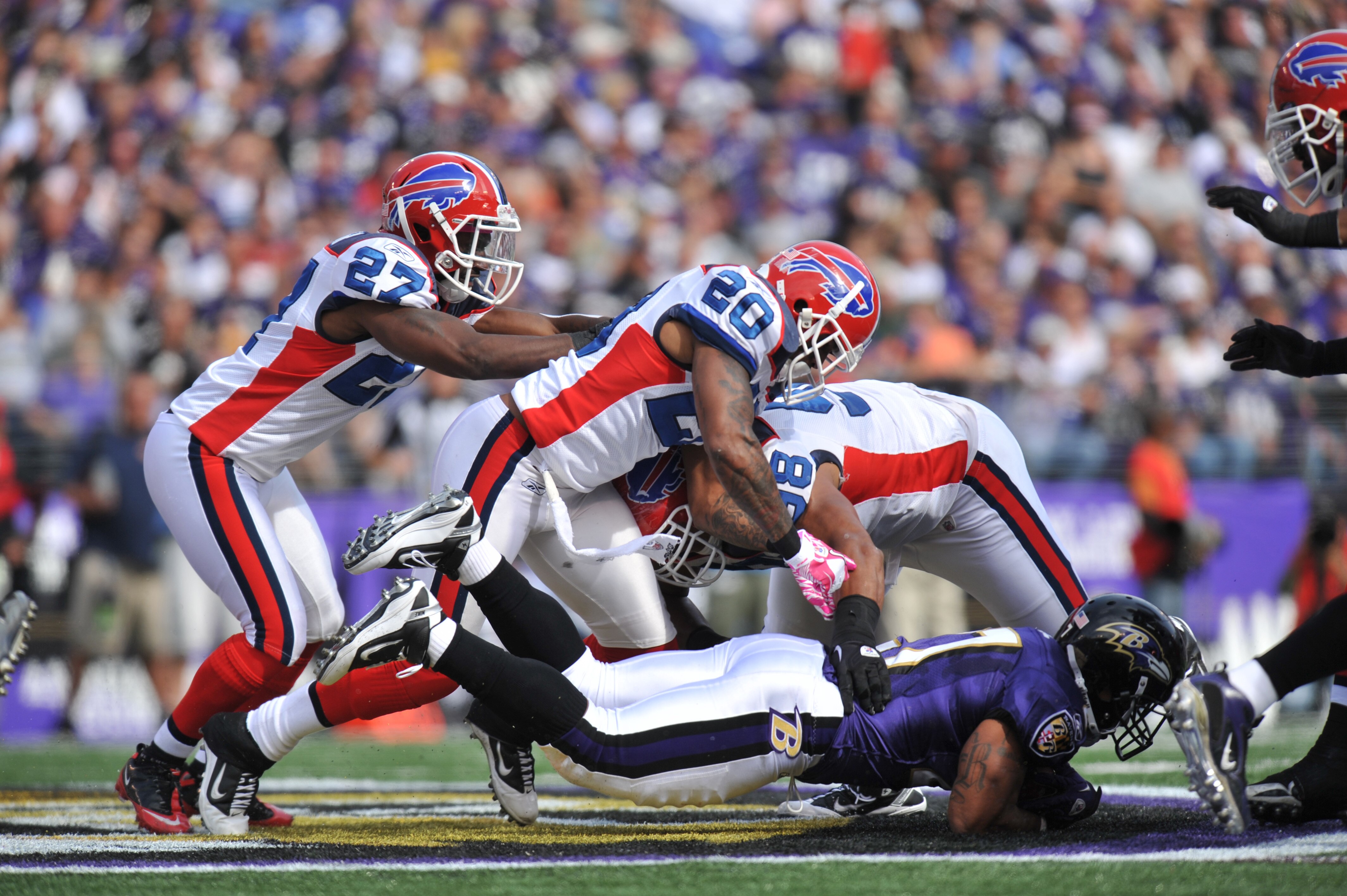 BALTIMORE, MD - OCTOBER 24:  Donte Whitner #20 of the Buffalo Bills runs the ball against the Baltimore Ravens at M&T Bank Stadium on October 24, 2010 in Baltimore, Maryland. The Ravens defeated the Bills 37-34. (Photo by Larry French/Getty Images)