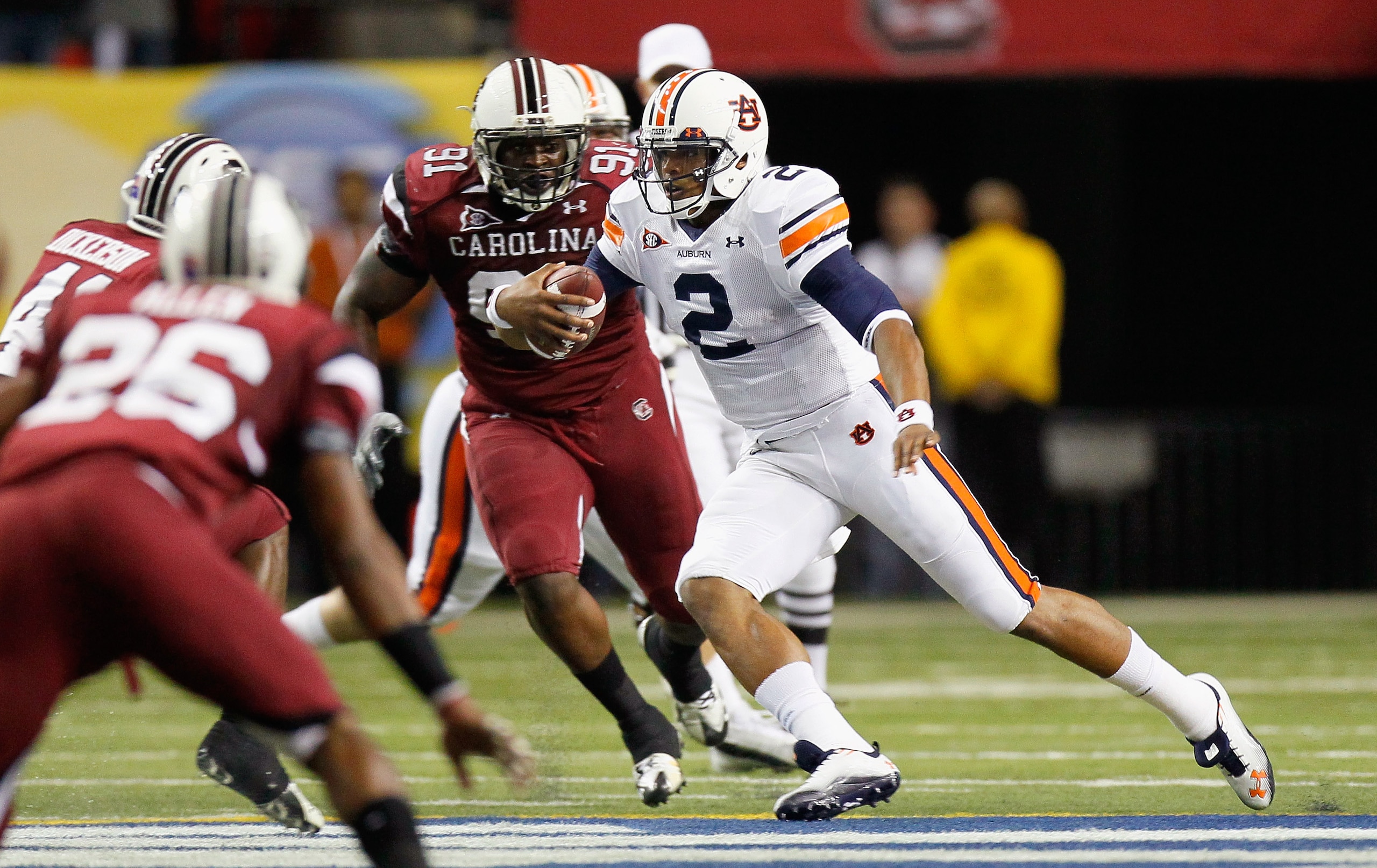 ATLANTA, GA - DECEMBER 04:  Quarterback Cam Newton #2 of the Auburn Tigers rushes upfield against the South Carolina Gamecocks during the 2010 SEC Championship at Georgia Dome on December 4, 2010 in Atlanta, Georgia.  (Photo by Kevin C. Cox/Getty Images)