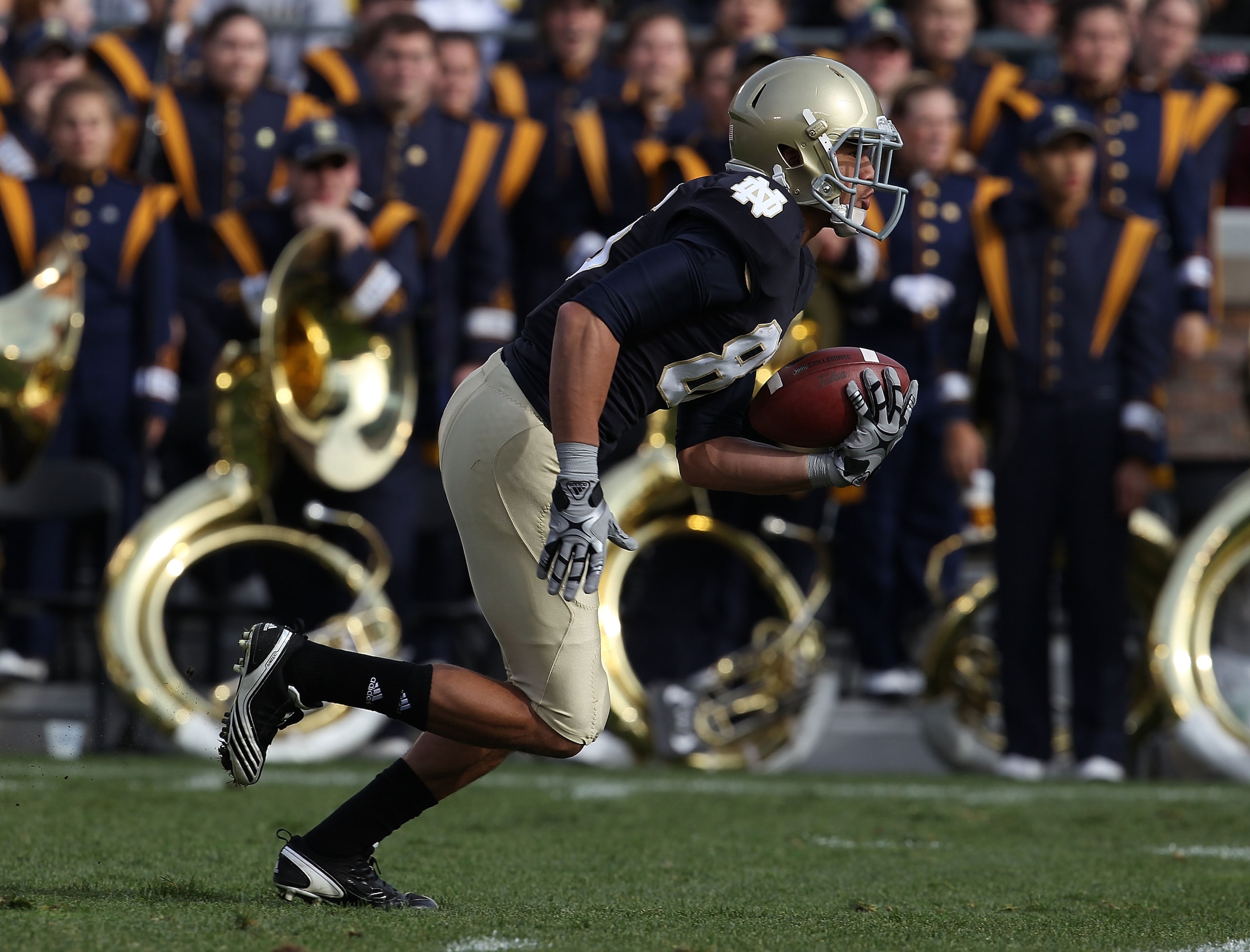 SOUTH BEND, IN - OCTOBER 30: Bennett Jackson #86 of the Notre Dame Fighting Irish fields a kick against the Tulsa Golden Hurricane at Notre Dame Stadium on October 30, 2010 in South Bend, Indiana. Tulsa defeated Notre Dame 28-27. (Photo by Jonathan Daniel