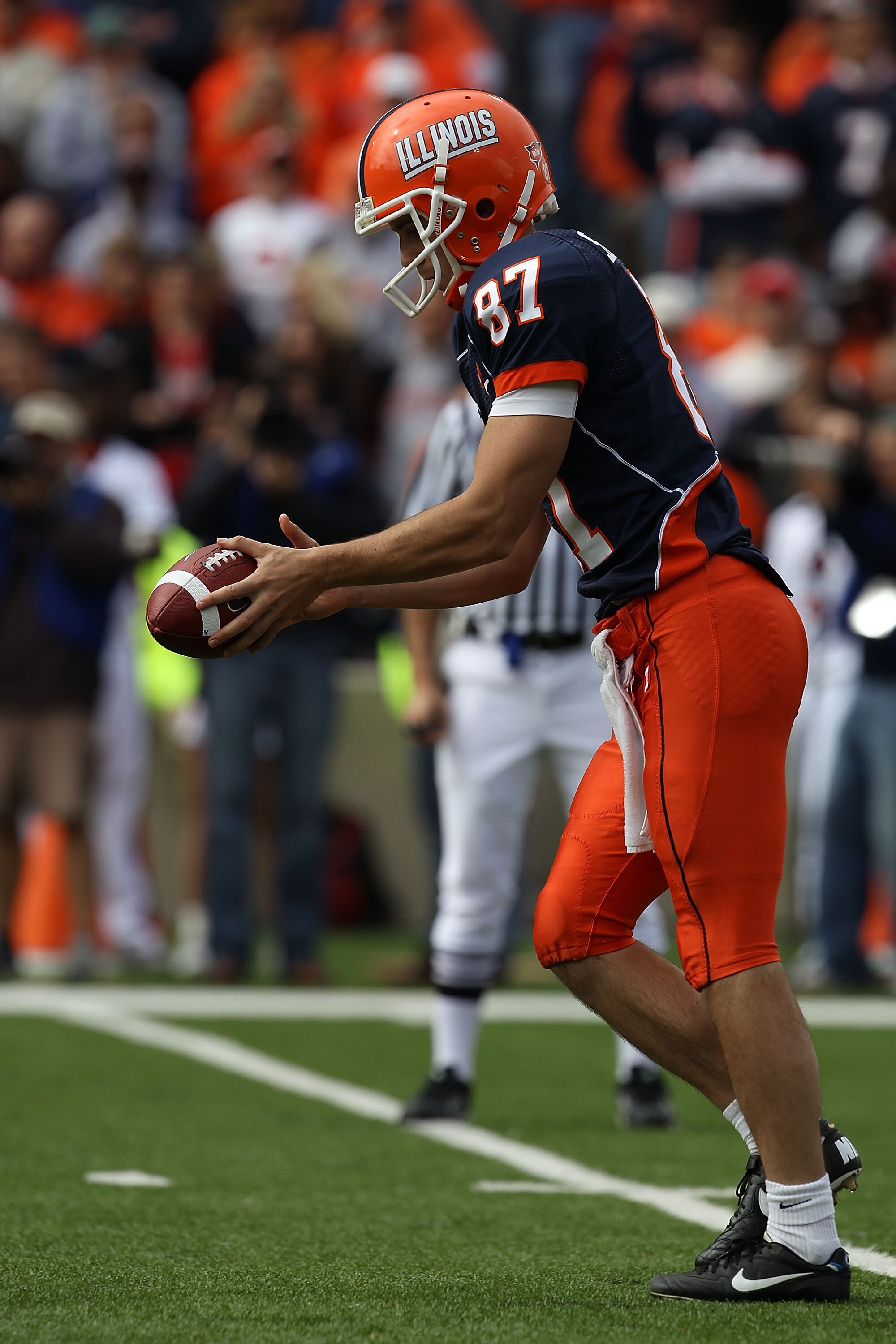 CHAMPAIGN, IL - OCTOBER 02: Anthony Santella #87 of the Illinois Fighting Illini punts the ball against the Ohio State Buckeyes at Memorial Stadium on October 2, 2010 in Champaign, Illinois. Ohio State defeated Illinois 24-13. (Photo by Jonathan Daniel/Ge