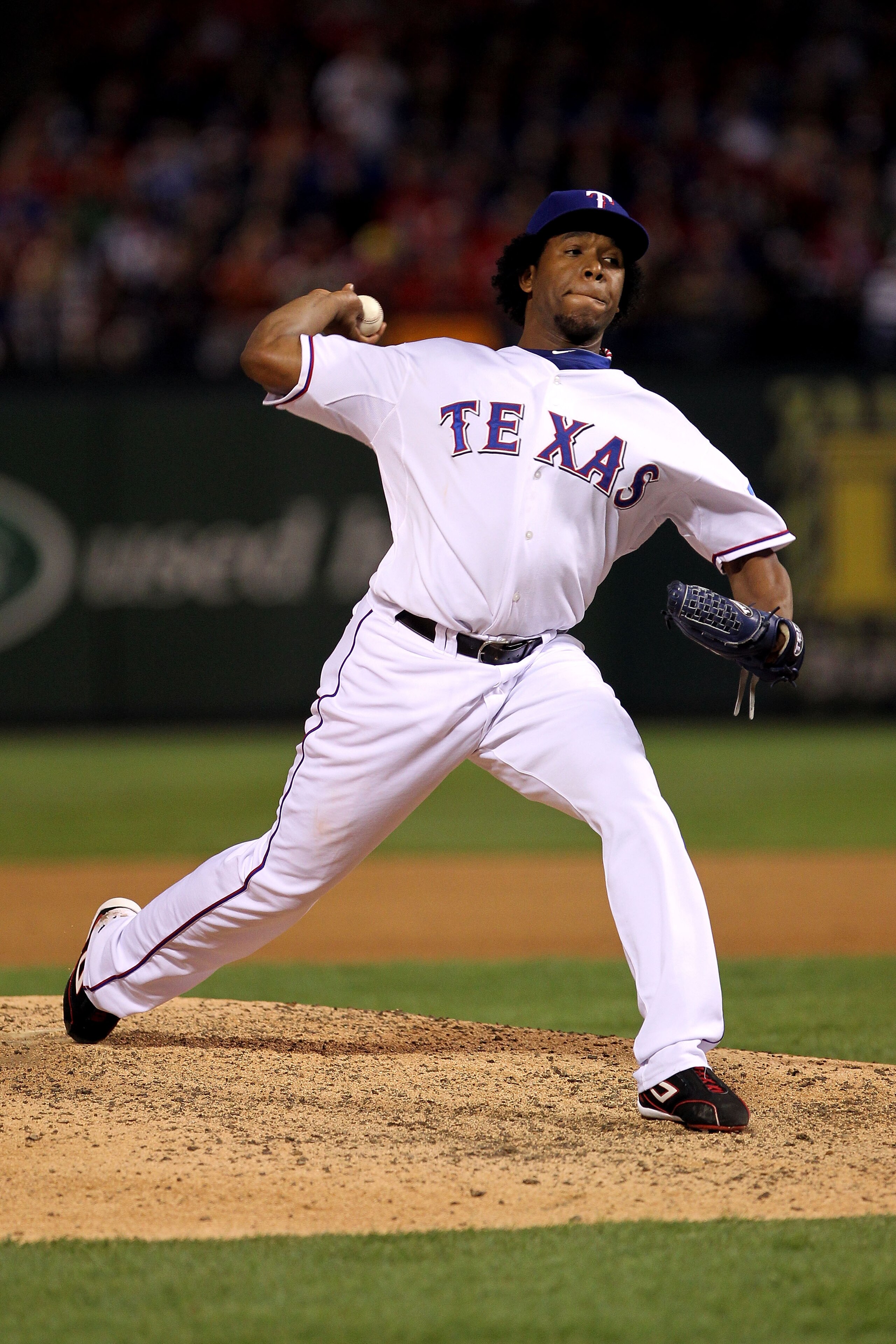 ARLINGTON, TX - NOVEMBER 01:  Neftali Feliz #30 of the Texas Rangers pitches against the San Francisco Giants in Game Five of the 2010 MLB World Series at Rangers Ballpark in Arlington on November 1, 2010 in Arlington, Texas. The Giants won 3-1.  (Photo b