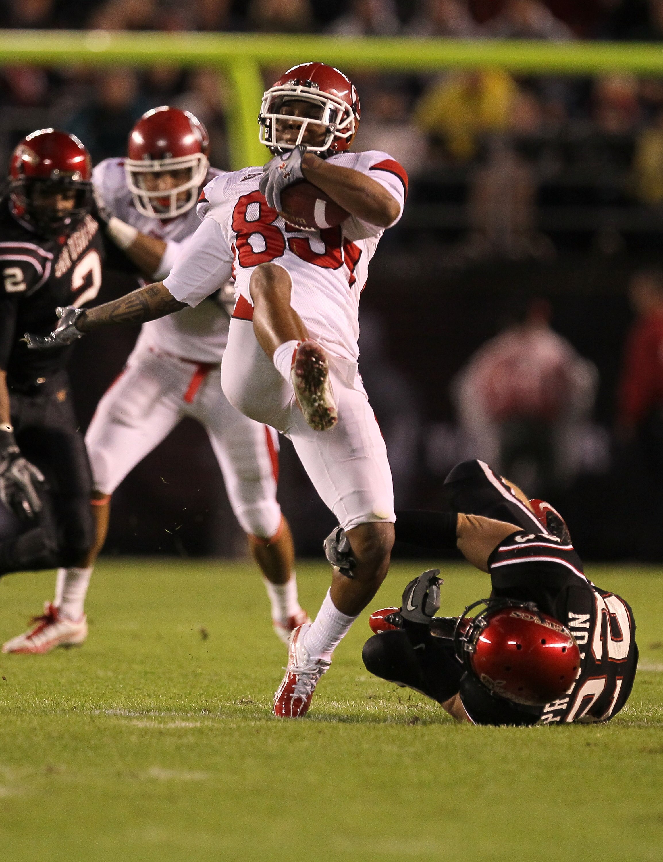 SAN DIEGO - NOVEMBER 20:  Wide receiver Jerome Brooks #85 of the Utah Utes comes down with a reception against the San Diego State Aztecs at Qualcomm Stadium on November 20, 2010 in San Diego, California.  (Photo by Stephen Dunn/Getty Images)