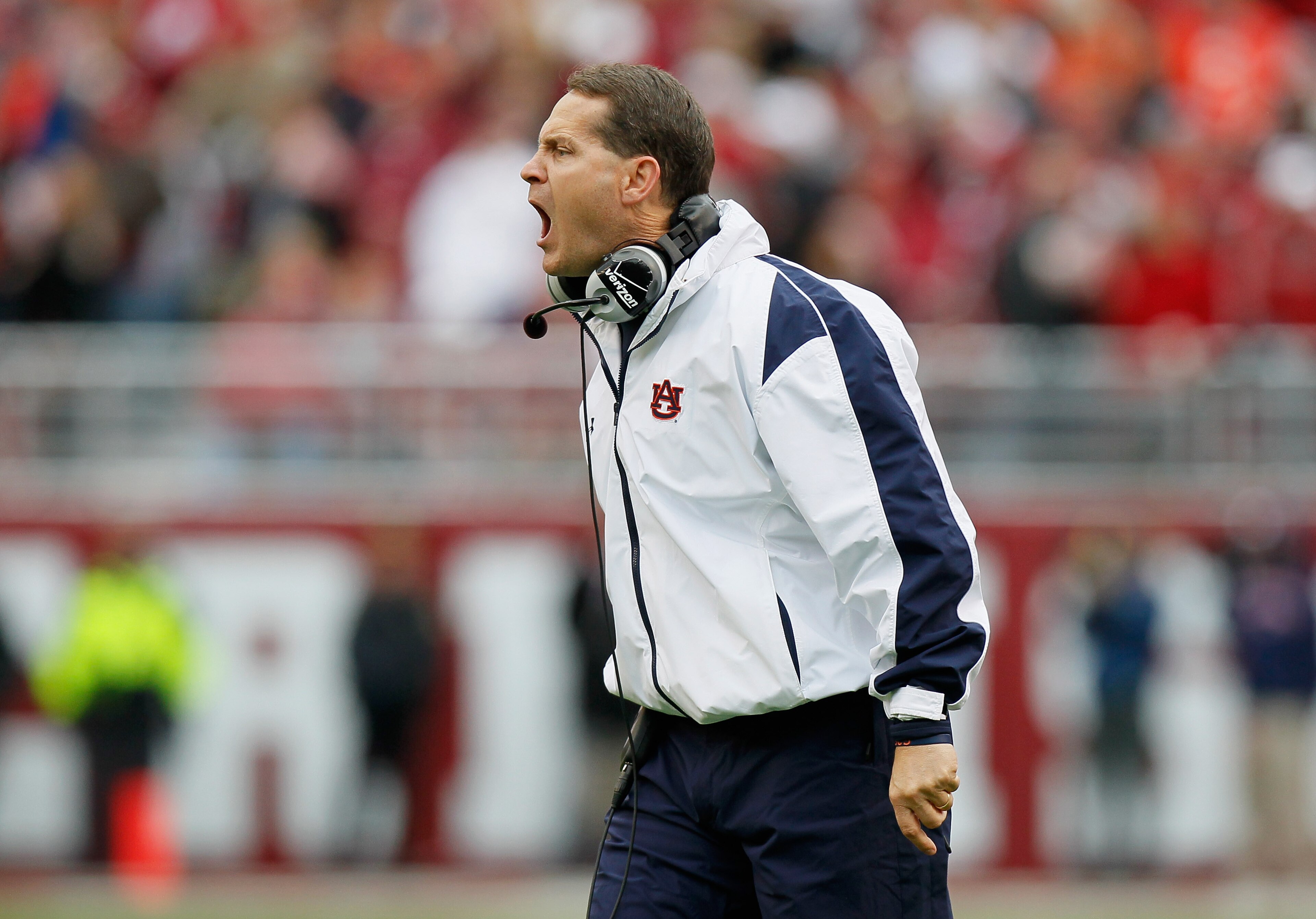 TUSCALOOSA, AL - NOVEMBER 26: Head coach Gene Chizik of the Auburn Tigers yells to his defense during the game against the Alabama Crimson Tide at Bryant-Denny Stadium on November 26, 2010 in Tuscaloosa, Alabama. (Photo by Kevin C. Cox/Getty Images) TUSCALOOSA, AL - NOVEMBER 26: Head coach Gene Chizik of the Auburn Tigers yells to his defense during the game against the Alabama Crimson Tide at Bryant-Denny Stadium on November 26, 2010 in Tuscaloosa, Alabama. (Photo by Kevin C. Cox/Getty Images)