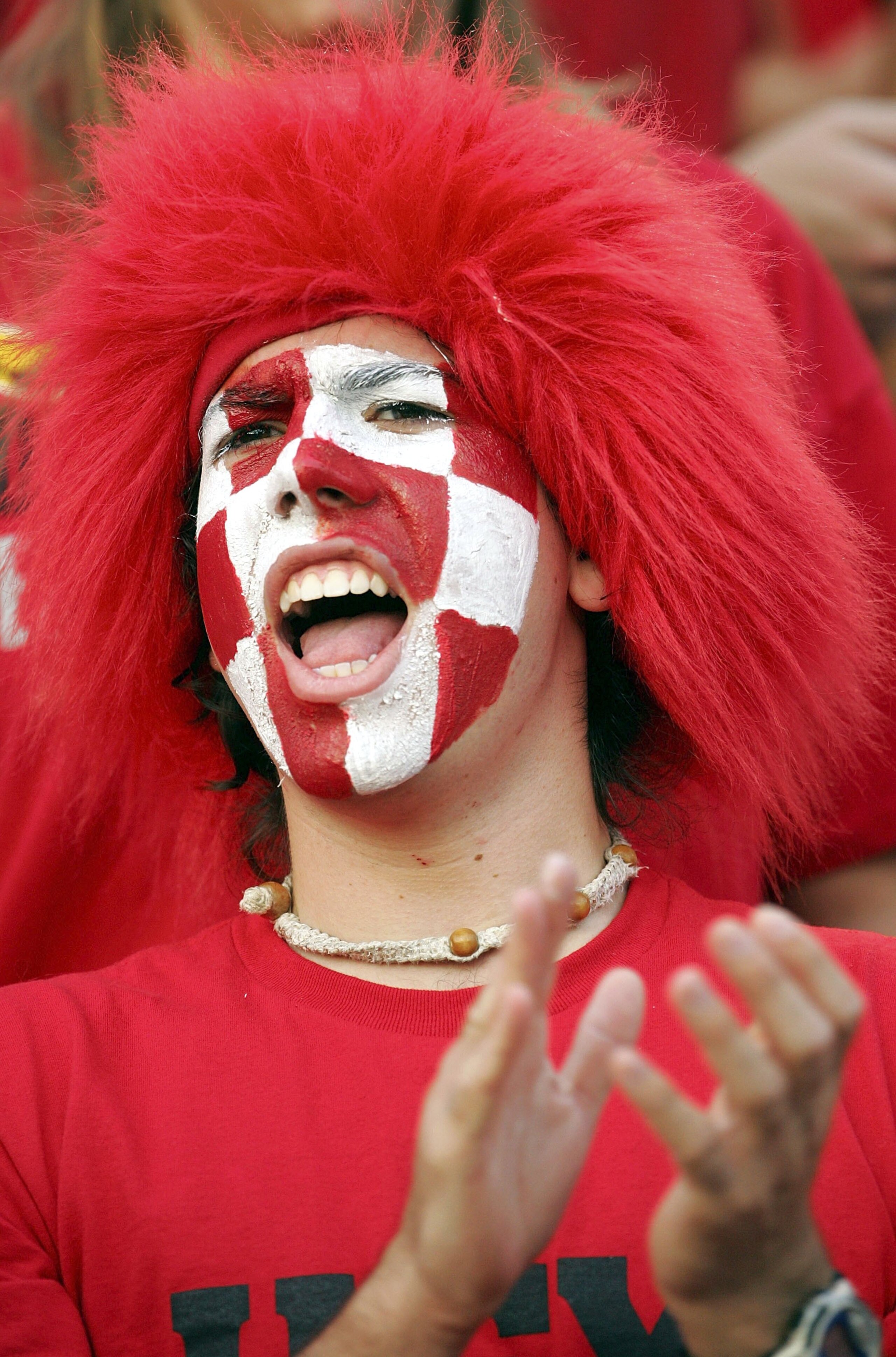 COLLEGE PARK, MD - NOVEMBER 11:  A Maryland Terrapins fan cheers after the Terps scored a touchdown during the game against the Miami Hurricanes on November 11, 2006 at Byrd Stadium in College Park, Maryland.  (Photo by Jamie Squire/Getty Images)