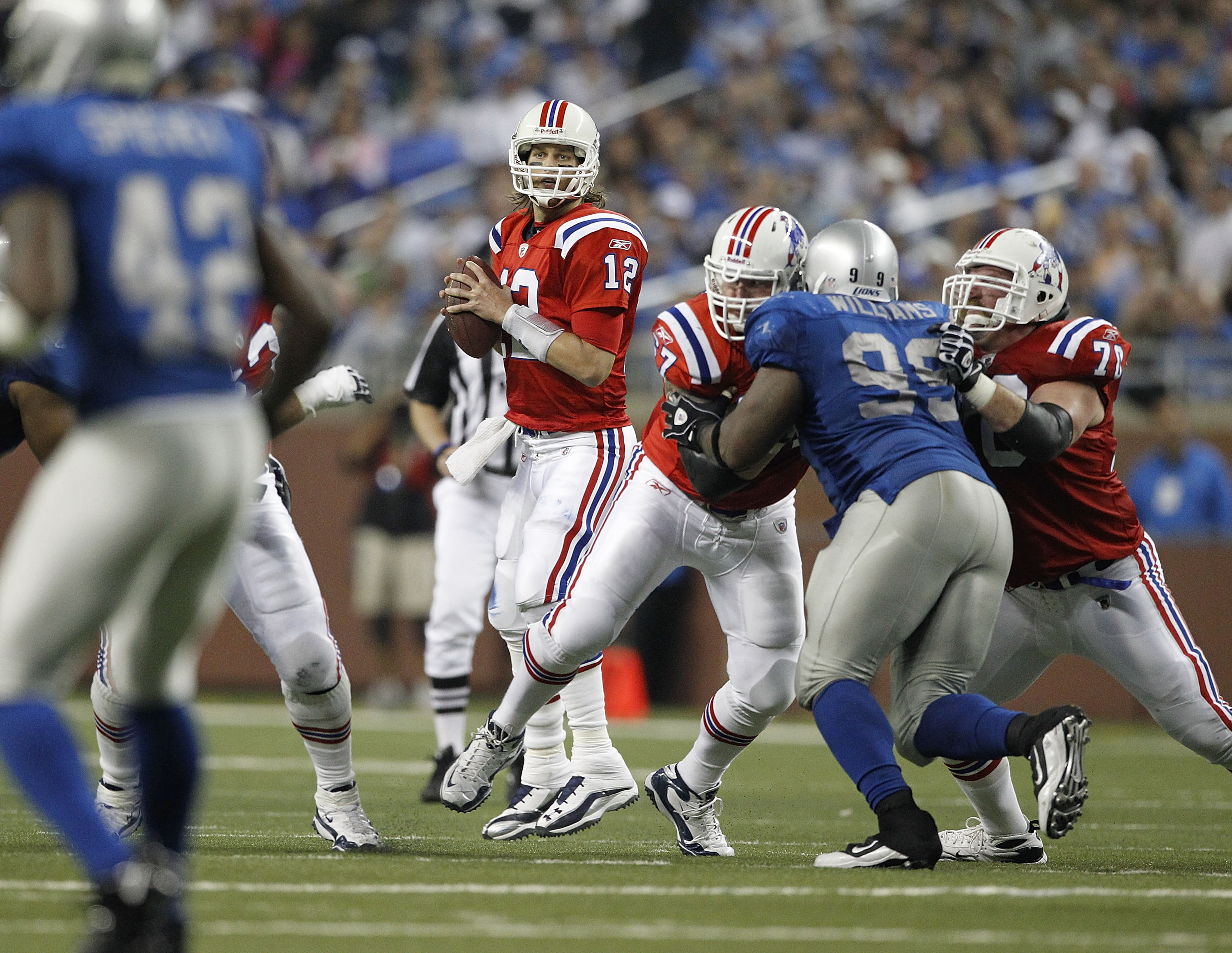 DETROIT - NOVEMBER 25: Tom Brady #12 of the New England Patriots drops back to pass during the game against the Detroit Lions at Ford Field on November 25, 2010 in Detroit, Michigan. New England defeated Detroit 45-24.  (Photo by Leon Halip/Getty Images)