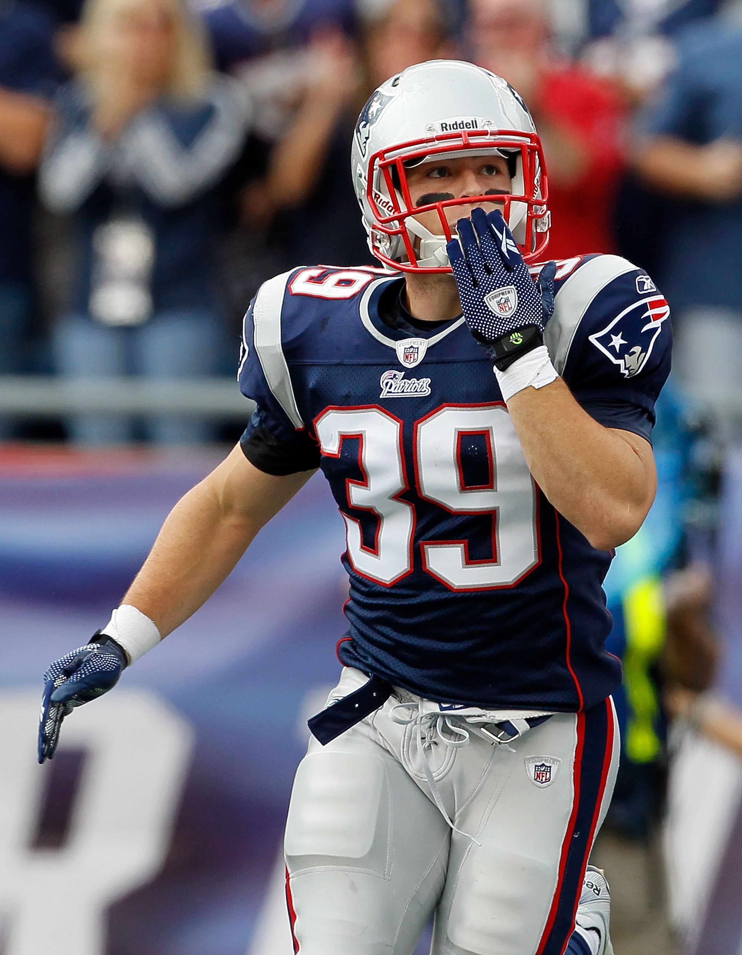 FOXBORO, MA - SEPTEMBER 26:  Danny Woodhead #39 of the New England Patriots reacts to the cheers of fans after he into the endzone for a touchdown against the Buffalo Bills at Gillette Stadium on September 26, 2010 in Foxboro, Massachusetts. (Photo by Jim