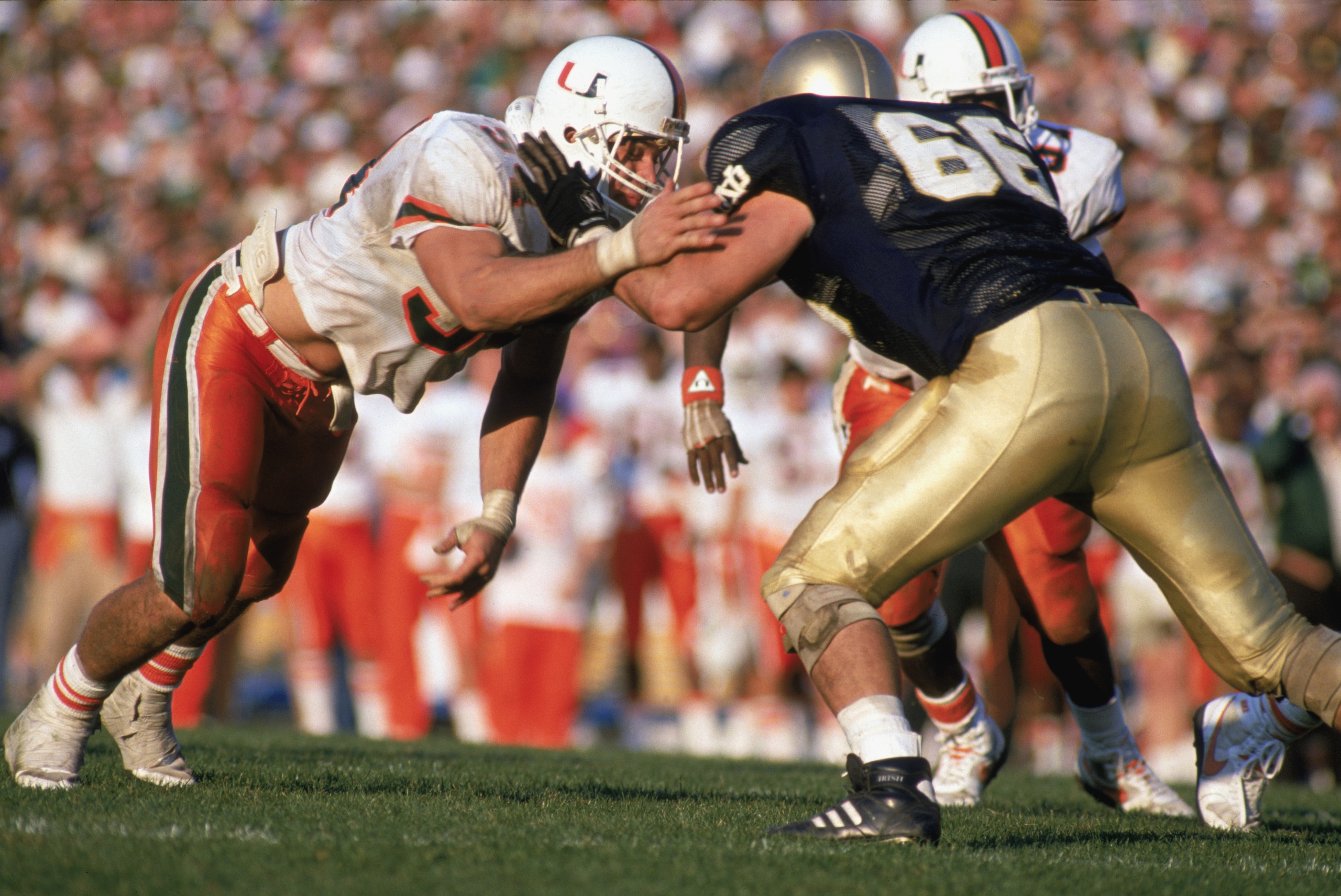 MIAMI - OCTOBER 15:  Bill Hawkins #54 of the University of Miami Hurricanes moves on the field during a game against Notre Dame Fighting Irish on October 15, 1988 in Miami, Florida. Notre Dames won 31-30. (Photo by: Jonathan Daniel/Getty Images)