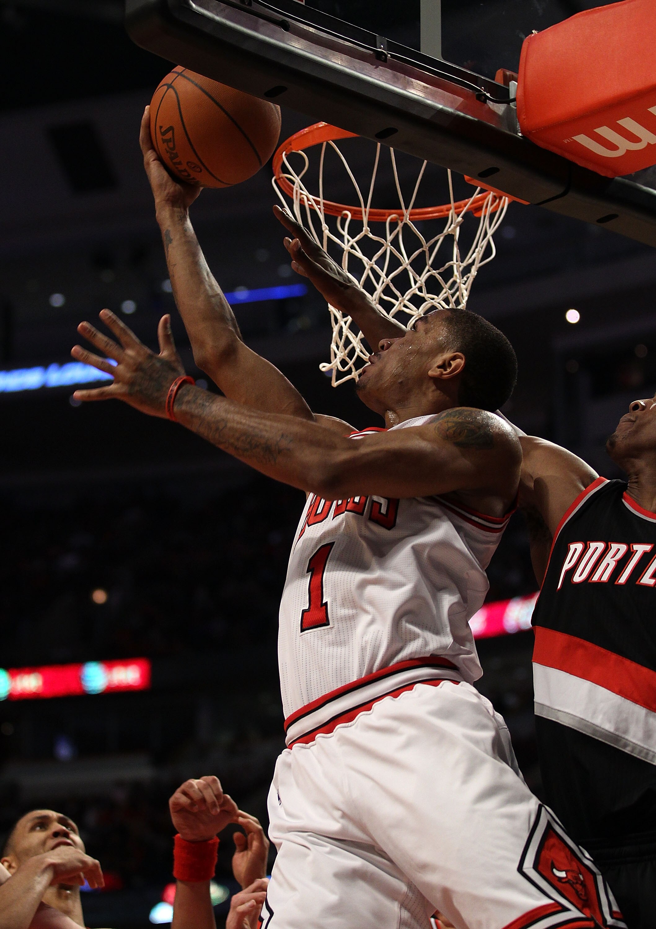 CHICAGO - NOVEMBER 01: Derrick Rose #1 of the Chicago Bulls puts up a reverse lay-up against the Portland Trail Blazers at the United Center on November 1, 2010 in Chicago, Illinois. The Bulls defeated the Trail Blazers 110-98. NOTE TO USER: User expressl