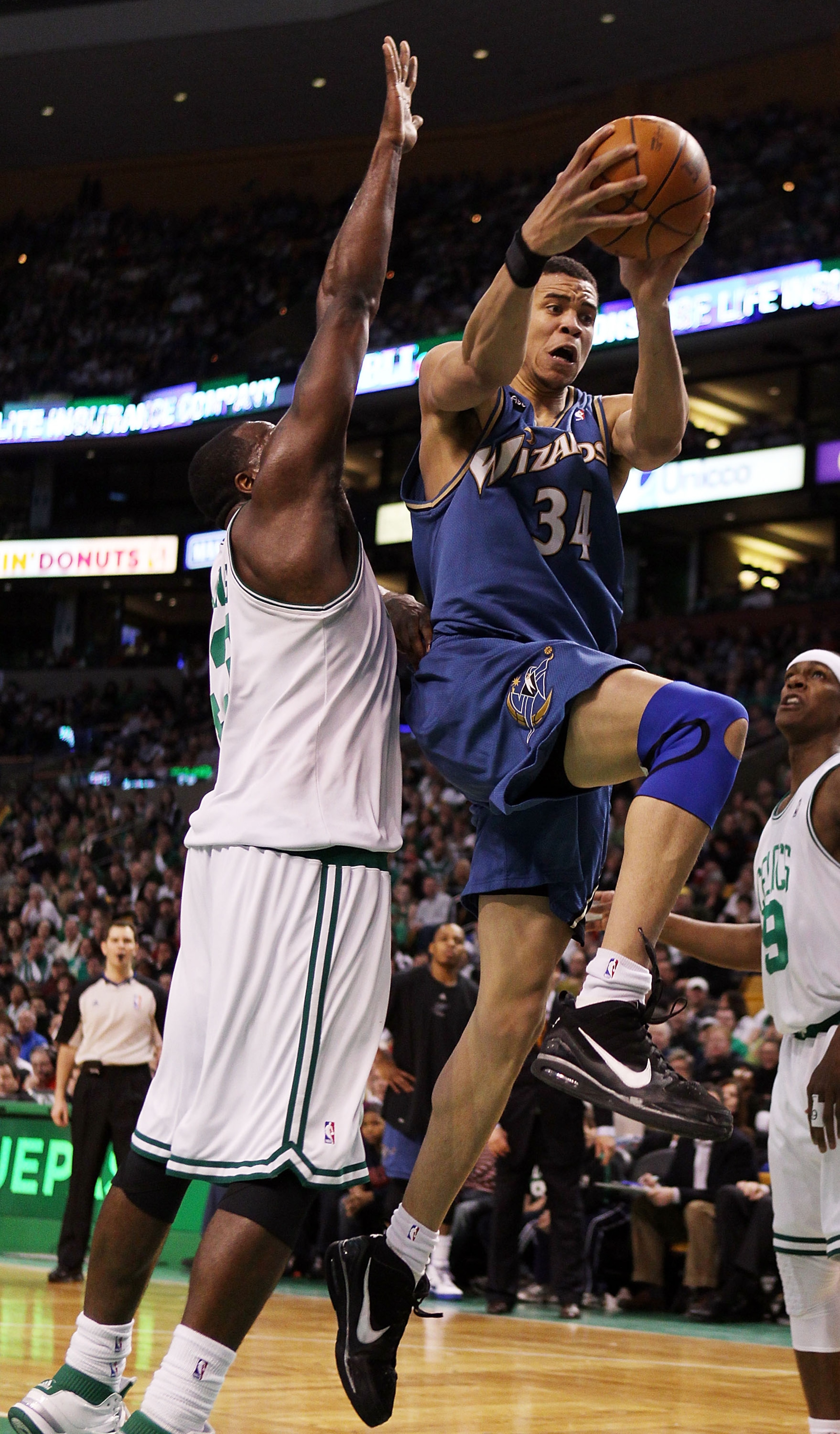 BOSTON - MARCH 07: JaVale McGee #34 of the Washington Wizards heads for the basket as Kendrick Perkins #43 of the Boston Celtics defends on March 7, 2010 at the TD Garden in Boston, Massachusetts. NOTE TO USER: User expressly acknowledges and agrees tha BOSTON - MARCH 07: JaVale McGee #34 of the Washington Wizards heads for the basket as Kendrick Perkins #43 of the Boston Celtics defends on March 7, 2010 at the TD Garden in Boston, Massachusetts. NOTE TO USER: User expressly acknowledges and agrees tha