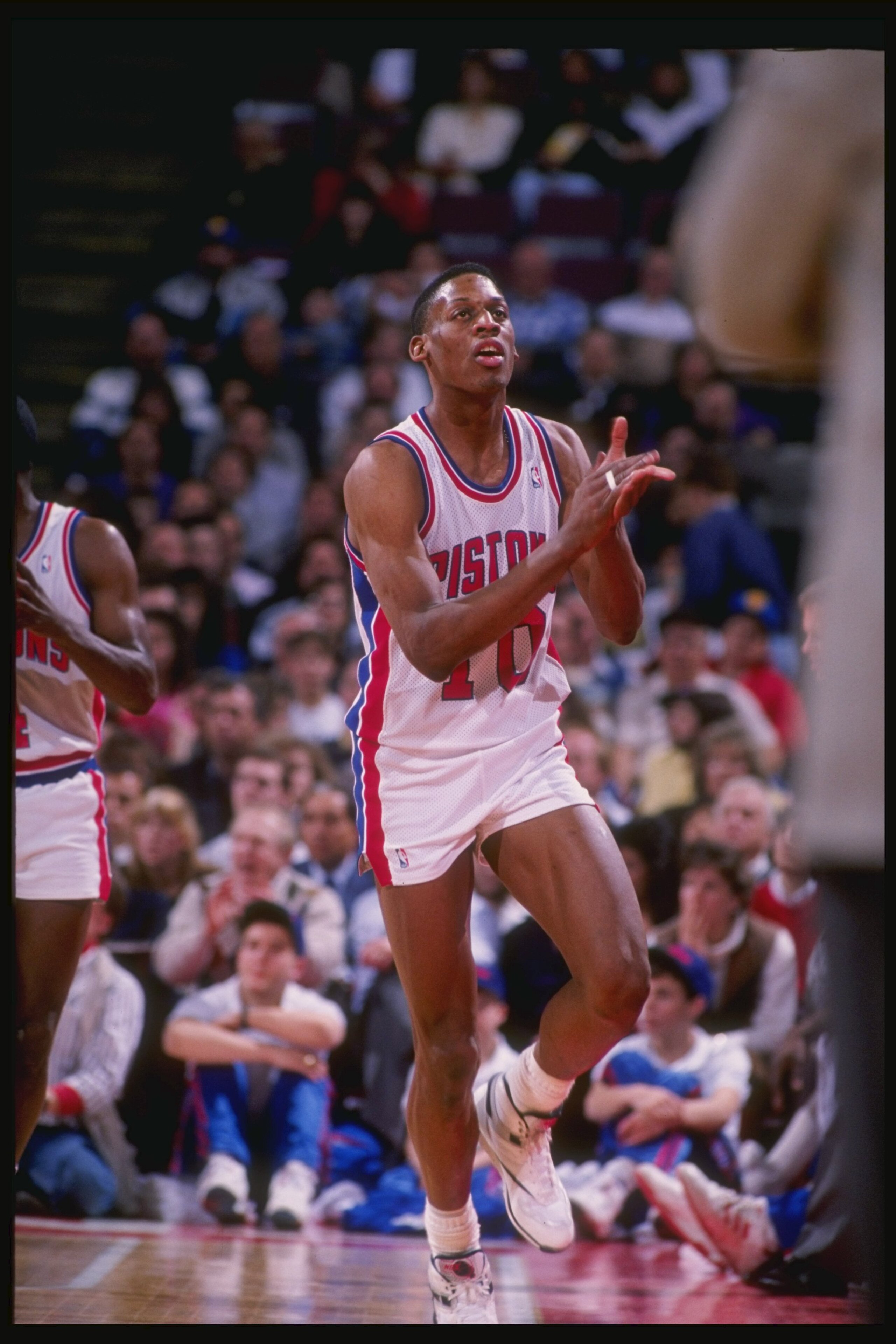 1989:  Forward Dennis Rodman of the Detroit Pistons runs down the court during a game at the Palace of Auburn Hills in Auburn Hills, Michigan. Mandatory Credit: Allsport  /Allsport