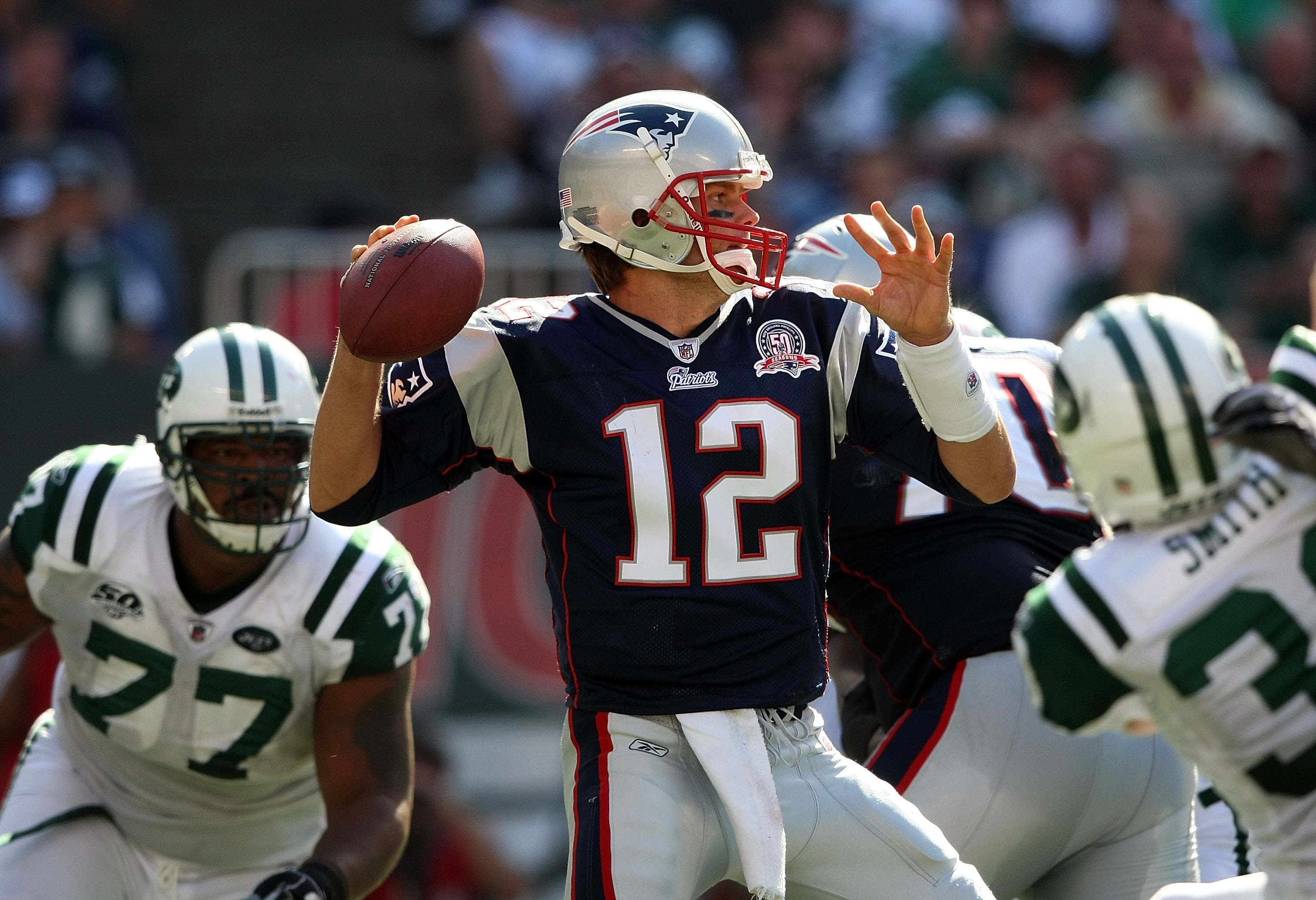 EAST RUTHERFORD, NJ - SEPTEMBER 20:  Tom Brady #12 of the New England Patriots throws a pass against the New York Jets at Giants Stadium on September 20, 2009 in East Rutherford, New Jersey.  (Photo by Nick Laham/Getty Images)