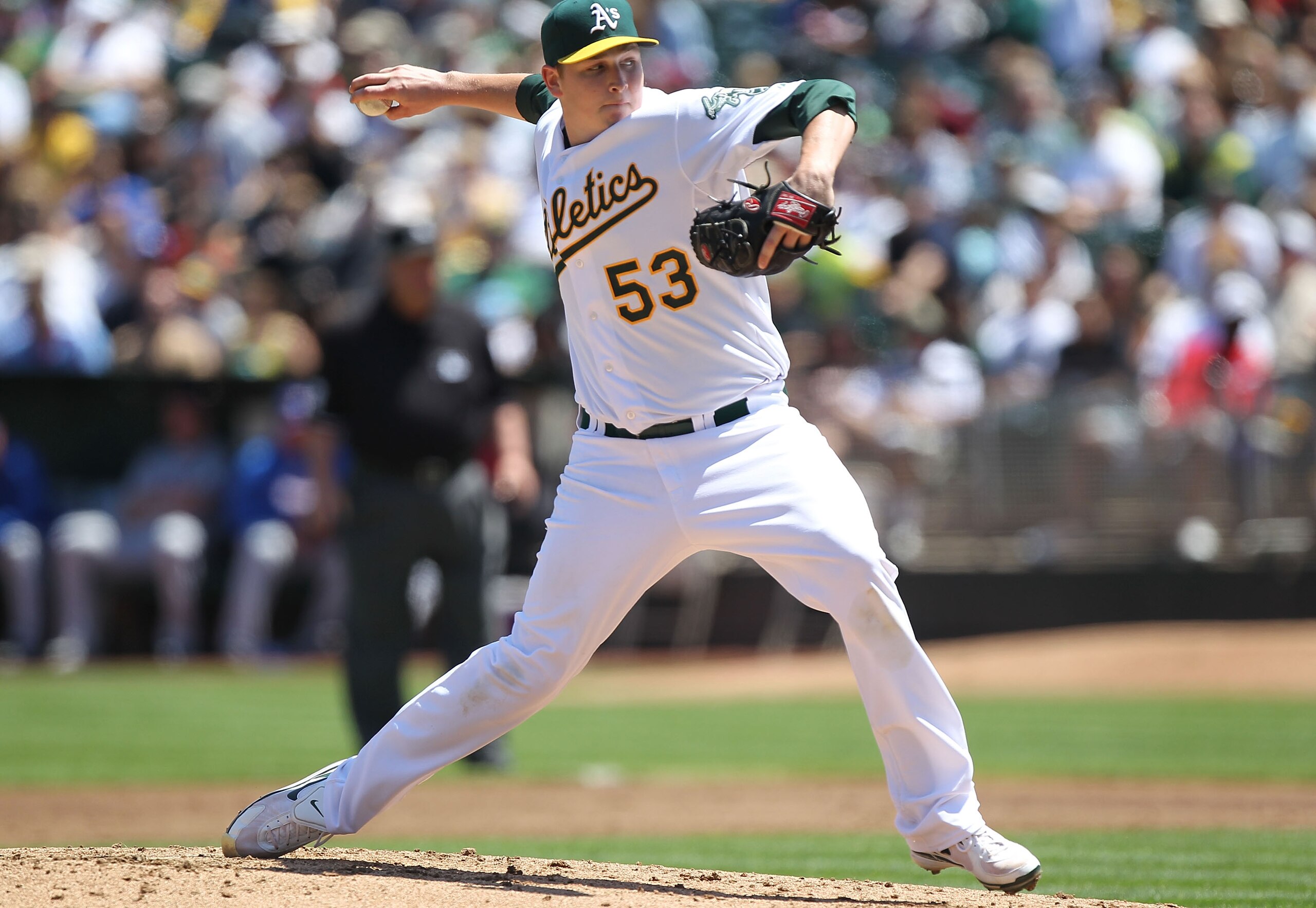 OAKLAND, CA - AUGUST 08:  Trevor Cahill #53 of the Oakland Athletics pitches against the Texas Rangers during an MLB game at the Oakland-Alameda County Coliseum on August 8, 2010 in Oakland, California.  (Photo by Jed Jacobsohn/Getty Images)