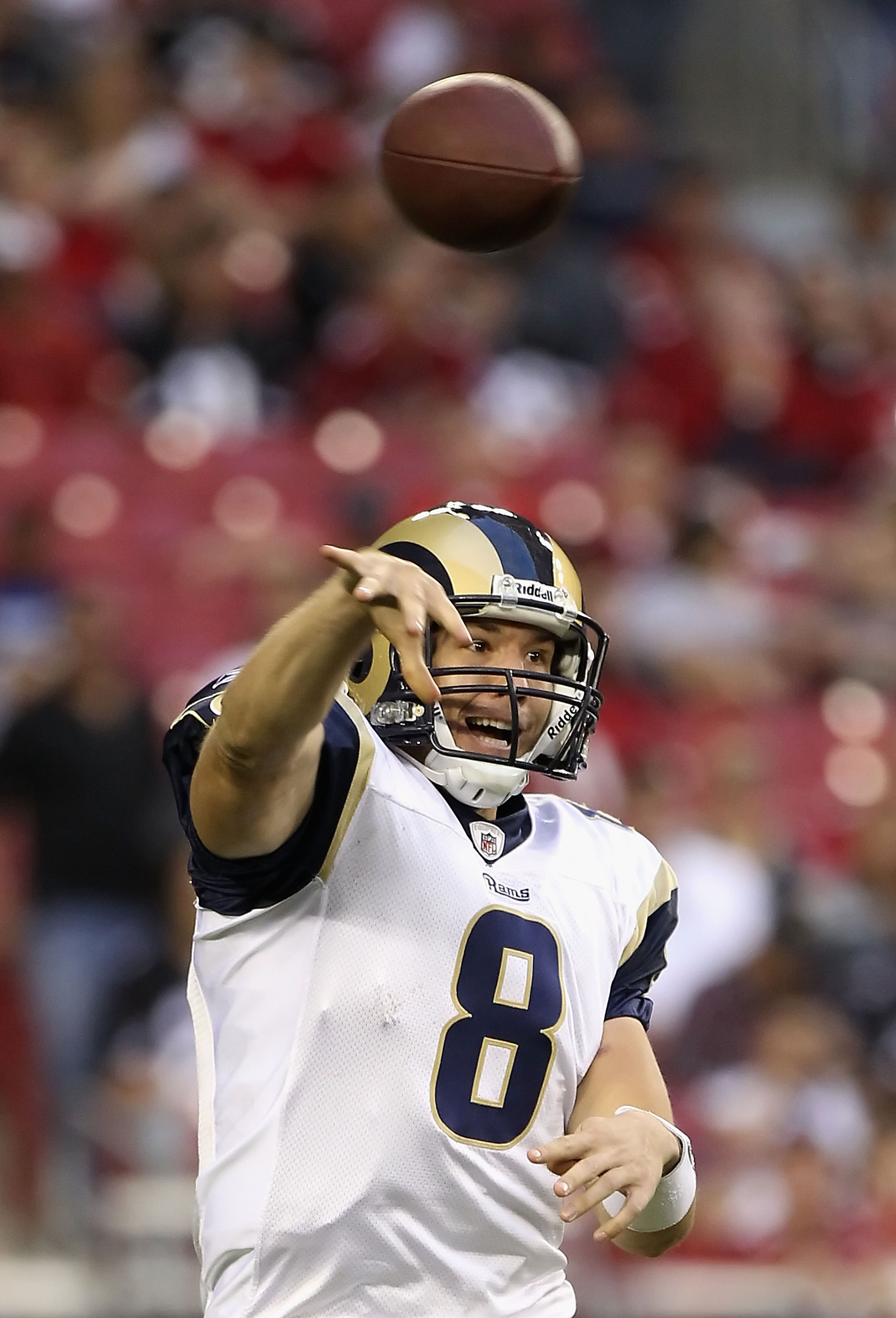 GLENDALE, AZ - DECEMBER 05:  Quarterback Sam Bradford #8 of the St. Louis Rams throws a pass during the NFL game against the Arizona Cardinals at the University of Phoenix Stadium on December 5, 2010 in Glendale, Arizona.  The Rams defeated the Cardinals